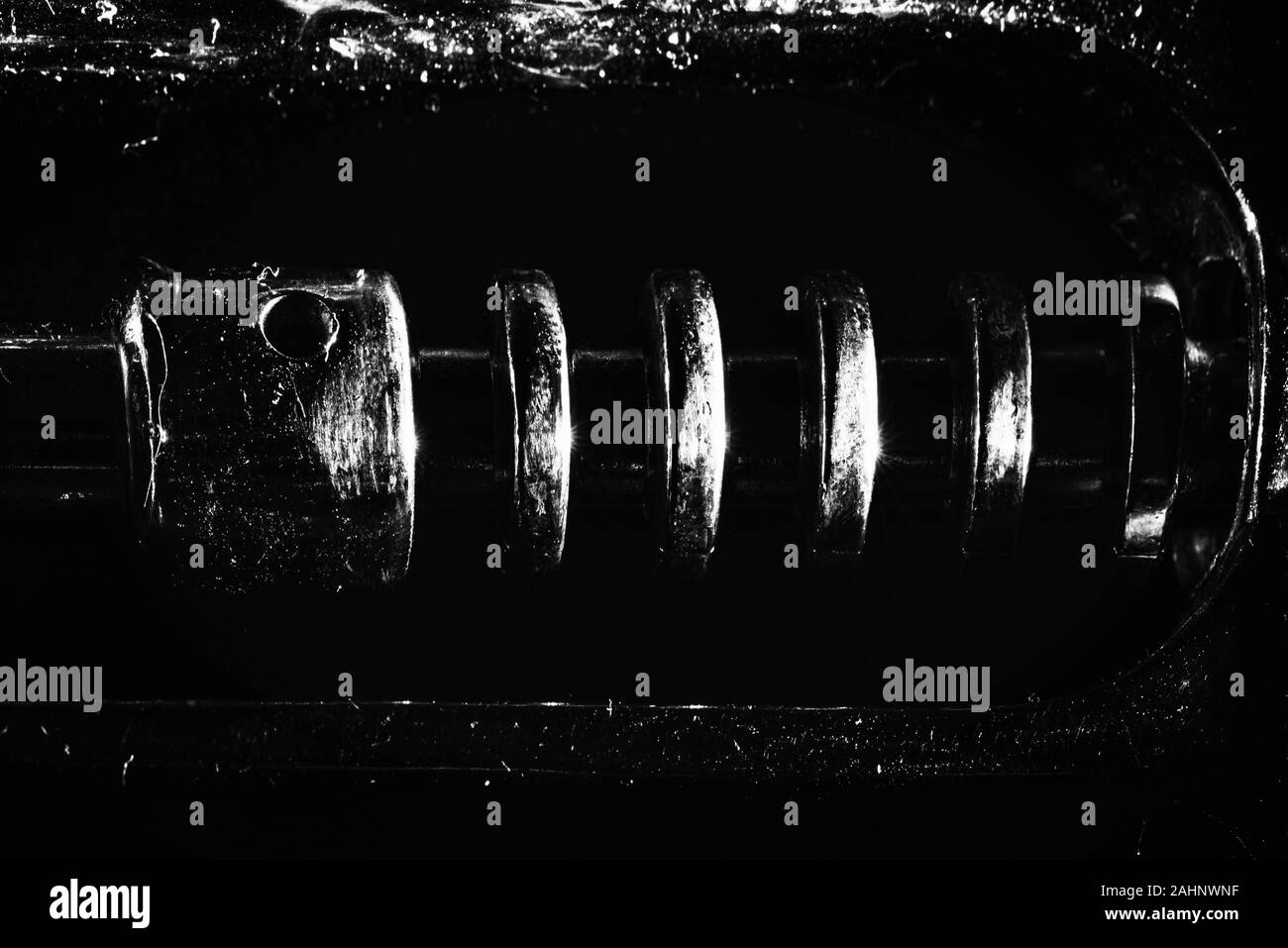 details of a corkscrew on a black background macro photography Stock