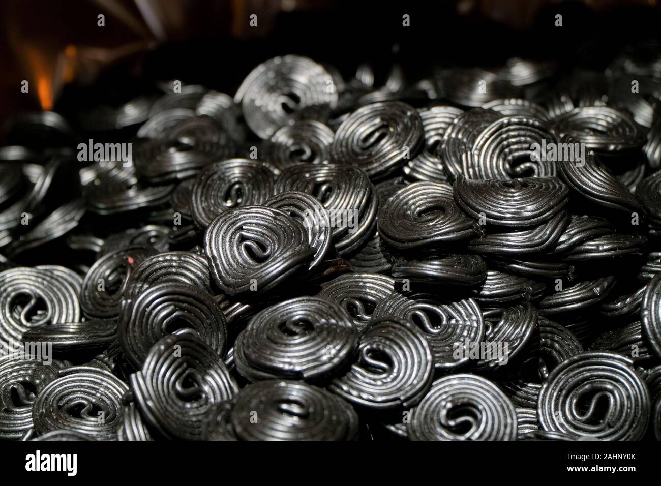 Licorice wheels candies. Candy flavored licorice. Top View Stock Photo