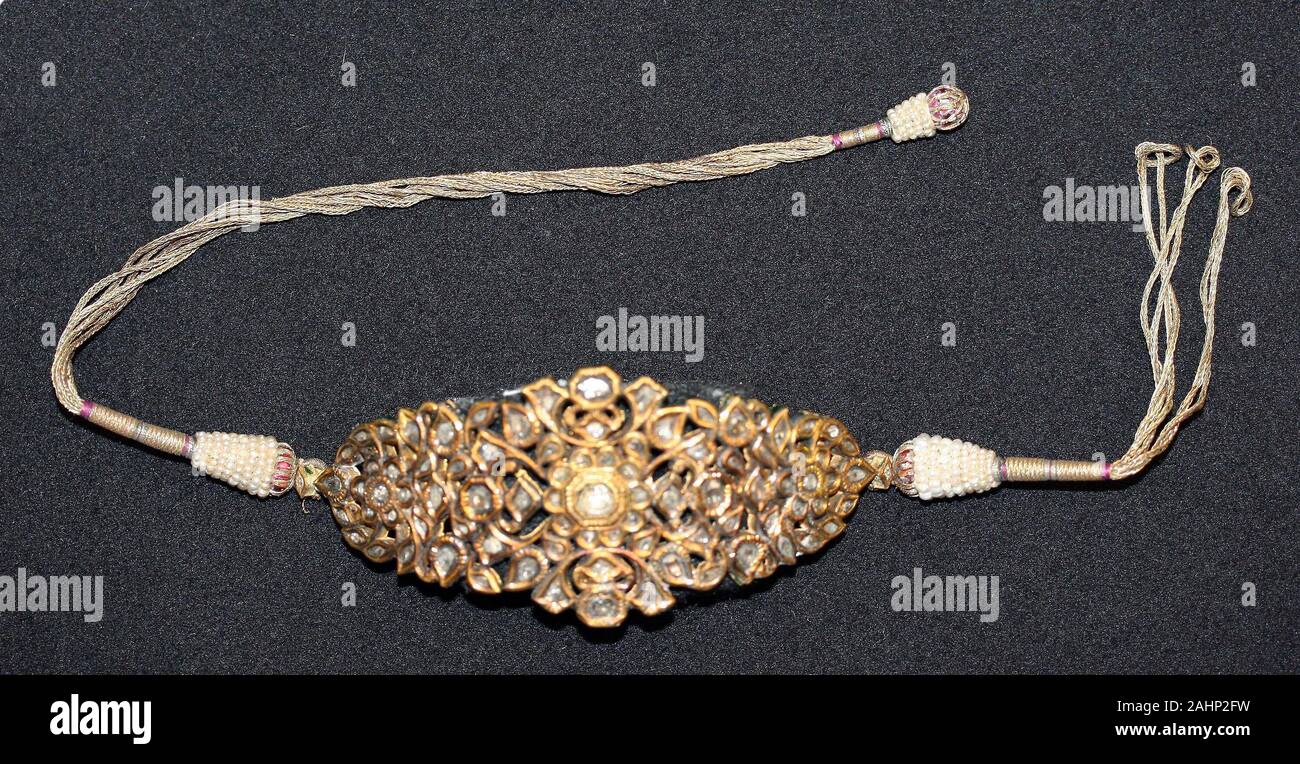 Armlet (Bazuband). 1801–1900. India. Gold, diamonds, and seed pearls inset in the kundan technique, with polychrome enamel (minakari) Stock Photo