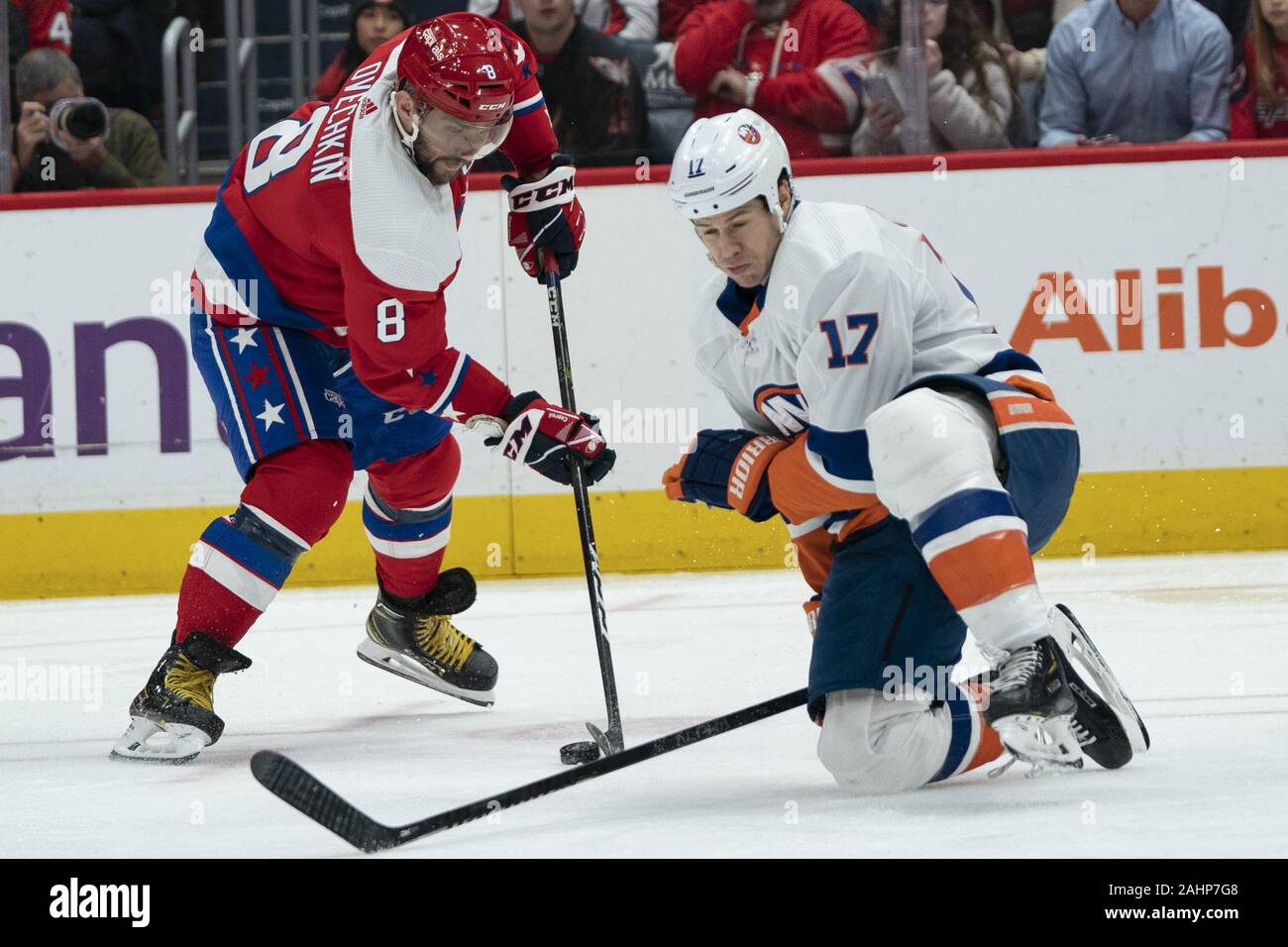 Washington Capitals left wing Alex Ovechkin (8) fakes a shot as New York Islanders left wing Matt Martin (17) looks to block during the second period at Capital One Arena in Washington, D.C. on Tuesday, December 31, 2019. The Washington Capitals finish the decade as the winningest team in the NHL with 465 wins since 2010. Photo by Alex Edelman/UPI Stock Photo