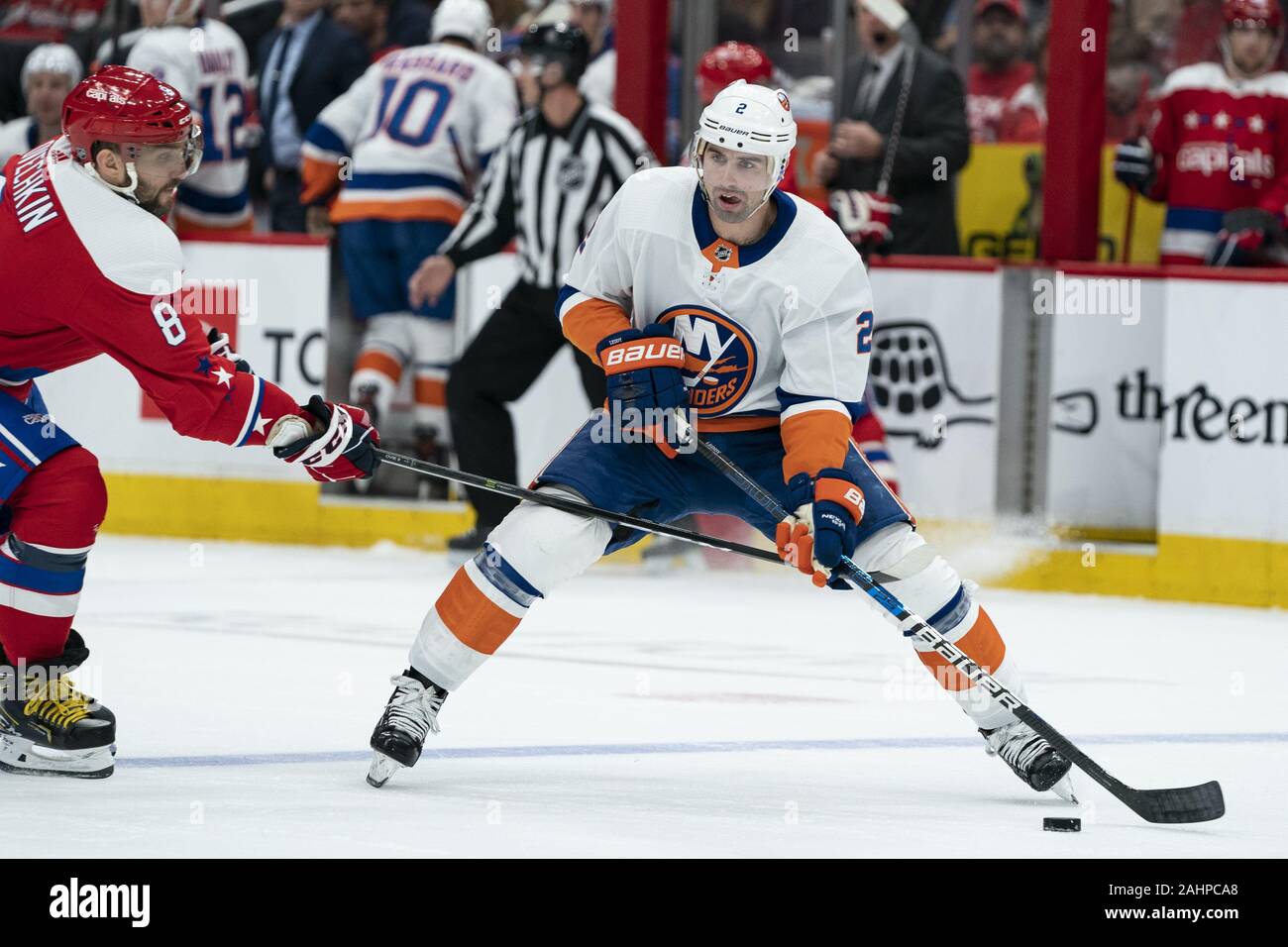 Washington, United States. 31st Dec, 2019. New York Islanders defenseman Nick Leddy (2) skates with the puck while defended by Washington Capitals left wing Alex Ovechkin (8) during the first period at Capital One Arena in Washington, DC on Tuesday, December 31, 2019. The Washington Capitals finish the decade as the winningest team in the NHL with 465 wins since 2010. Photo by Alex Edelman/UPI Credit: UPI/Alamy Live News Stock Photo