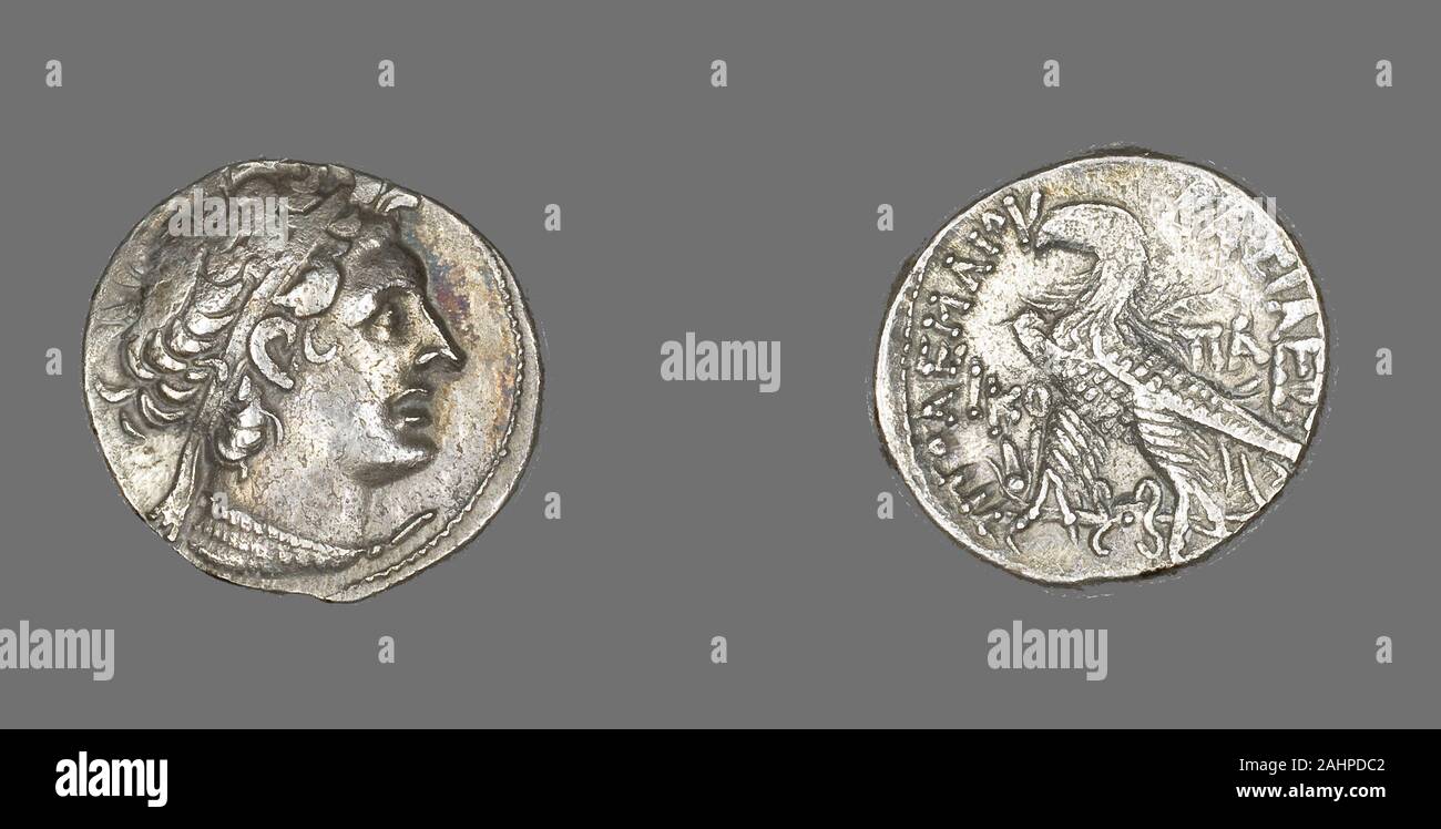 Ancient Greek. Tetradrachm (Coin) Portraying King Ptolemy I. 53 BC–52 BC. Egypt. Silver The Ptolemaic bloodline was running thin when Ptolemy XII bought his way onto the throne. His bribes, paid to Julius Caesar and other Roman generals, opened Egypt to Rome’s ambitions of empire. He was a weak leader, a drunkard, and no match for his Roman allies. At his death he insisted that his son share the rule with his sister, the legendary Queen Cleopatra VII, but she soon disposed of her brother in order to rule alone. Stock Photo