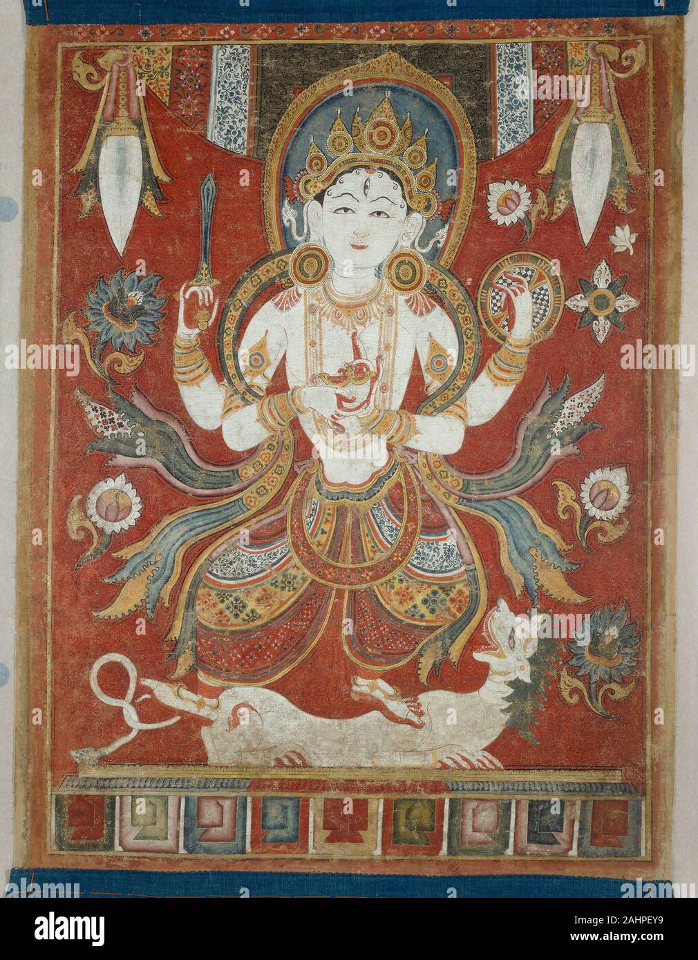 Double-Sided Painted Banner (Paubha) with God Shiva and Goddess Durga. 1501–1700. Nepal. Pigment and gold on cotton In this dynamic, double-sided painted banner from Nepal, designed to be carried high over the heads of the crowd during a religious festival, the Hindu God Shiva dances on his bull, Nandi, who turns his head upward to look lovingly at his Lord. This may represent Shiva as Nataraja, Lord of Dance, who is often depicted dancing atop his bull in Nepal. The other side depicts Durga, Shiva’s shakti (energy), dancing on a white snow lion.The remarkably well-preserved painting is enlive Stock Photo