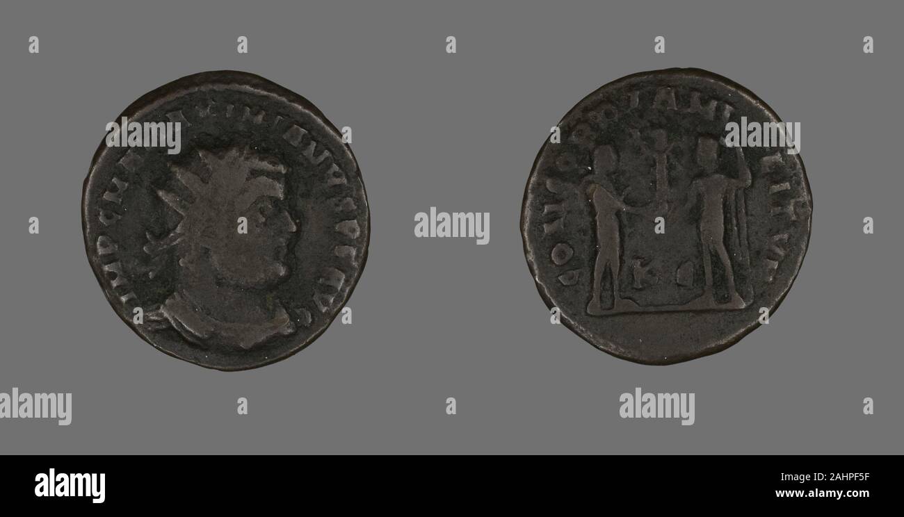 Ancient Roman. Coin Portraying Emperor Maximianus. 286 AD–305 AD. Roman Empire. Bronze Stock Photo
