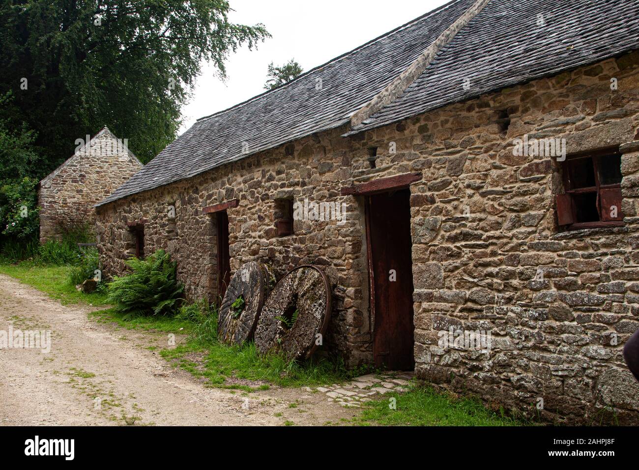 France, Brittany, Comanna,  Les Moulins de Kerouat,  1619 monastic village of hide tanning, milling, stone mills, grains, Stock Photo