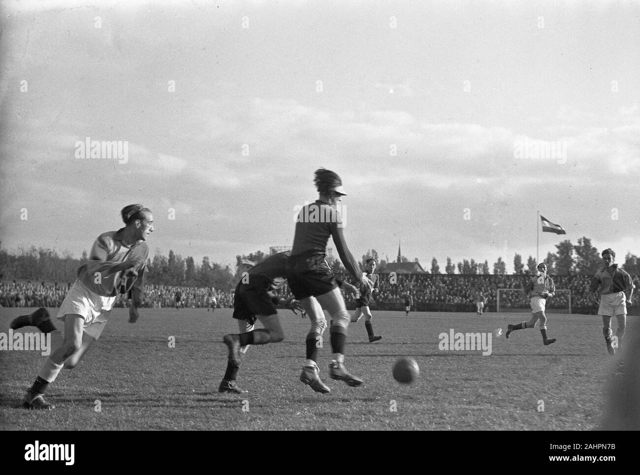 Historical Football (soccer) game - DWS against EDO 1-3 (team EDO) ca. October 18, 1947  Image from Netherlands, most likely one or two Dutch teams playing one another. Stock Photo