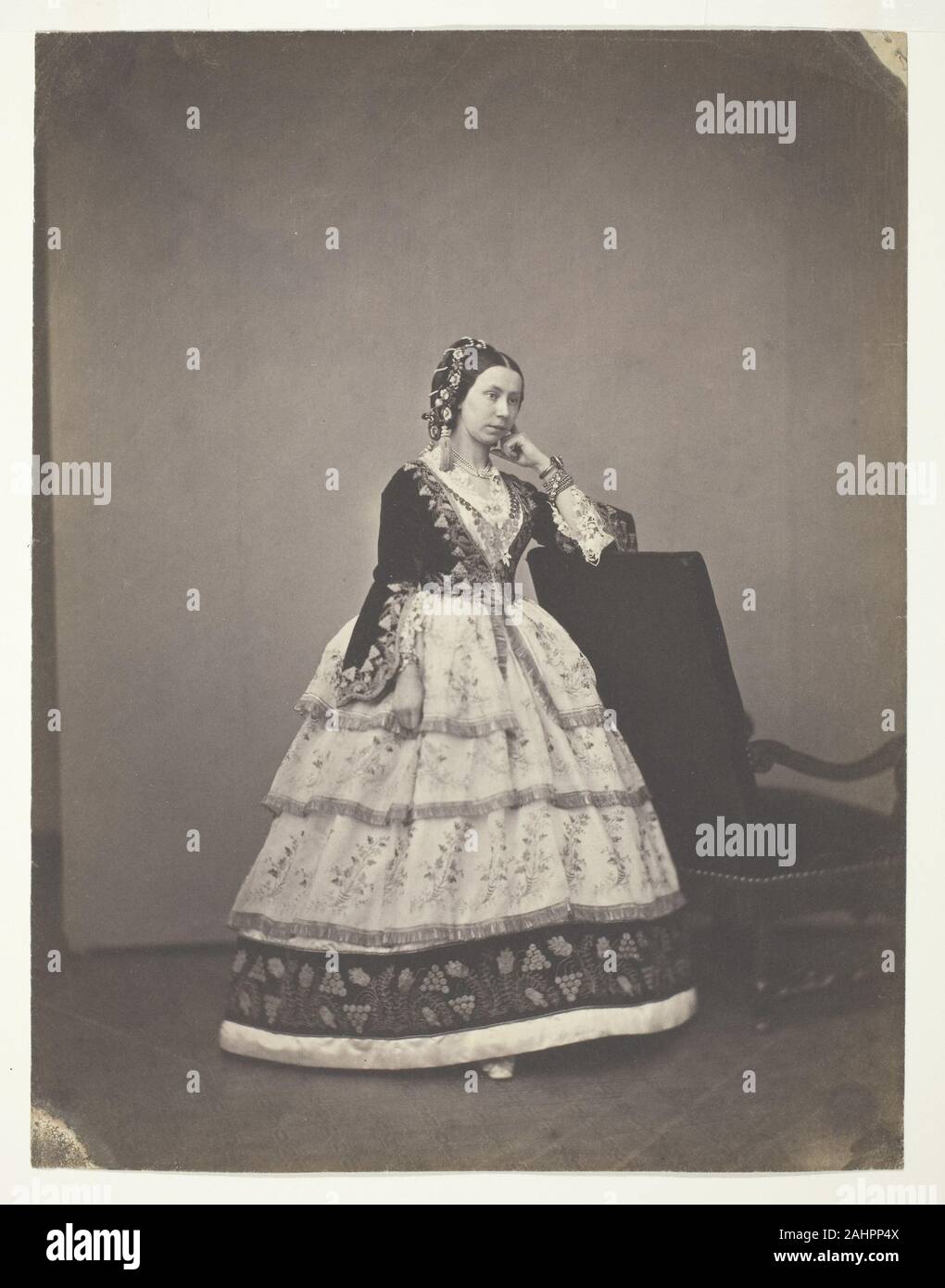 Mayer et Pierson. Madame Carrelle. 1856–1857. France. Salted paper print The studio known as Mayer and Pierson was the joint venture of Pierre-Louis Pierson (1822–1913), and brothers Léopold Ernest Mayer (1817–1865) and Louis Frédéric Mayer (1822–1912), who also had run separate daguerreotype studios in Paris. Working in partnership from 1855, the trio captured portraits of French society and royalty, most notably the family and court of Napoleon III. The studio became known for an objective, unmannered, but elegantly fashionable style that became popular in the French capital. This example sh Stock Photo