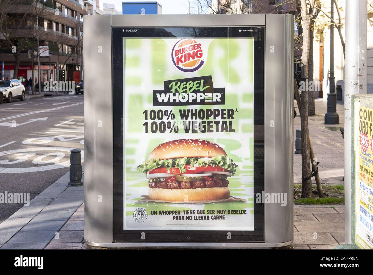 Spain. 29th Dec, 2019. Street commercial ad from American fast-food hamburger Burger King restaurant chain offering a 100% vegetarian hamburger seen in Madrid, Spain. Credit: Budrul Chukrut/SOPA Images/ZUMA Wire/Alamy Live News Stock Photo