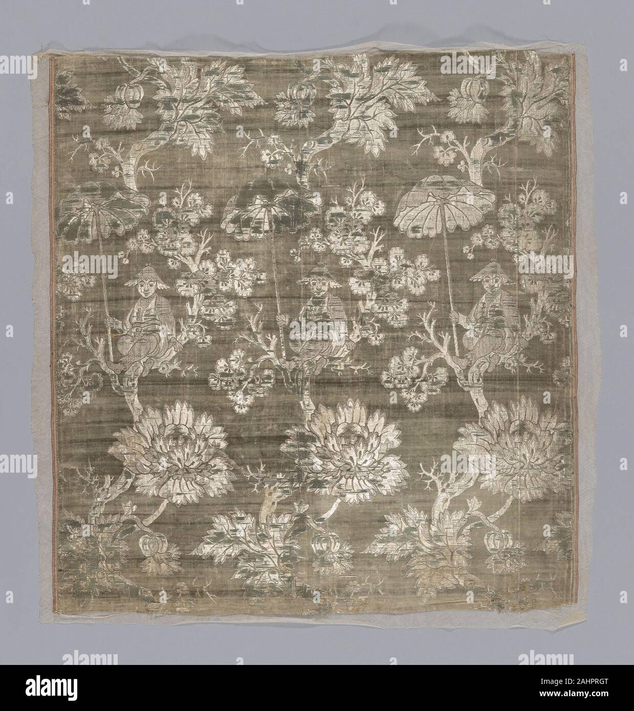 Panel (Dress Fabric). 1725–1775. China. Silk, warp-float faced 7 1 satin weave with supplementary binding warps tying supplementary patterning wefts in twill and self-patterning ground wefts in plain interlacings; two selvages present Stock Photo