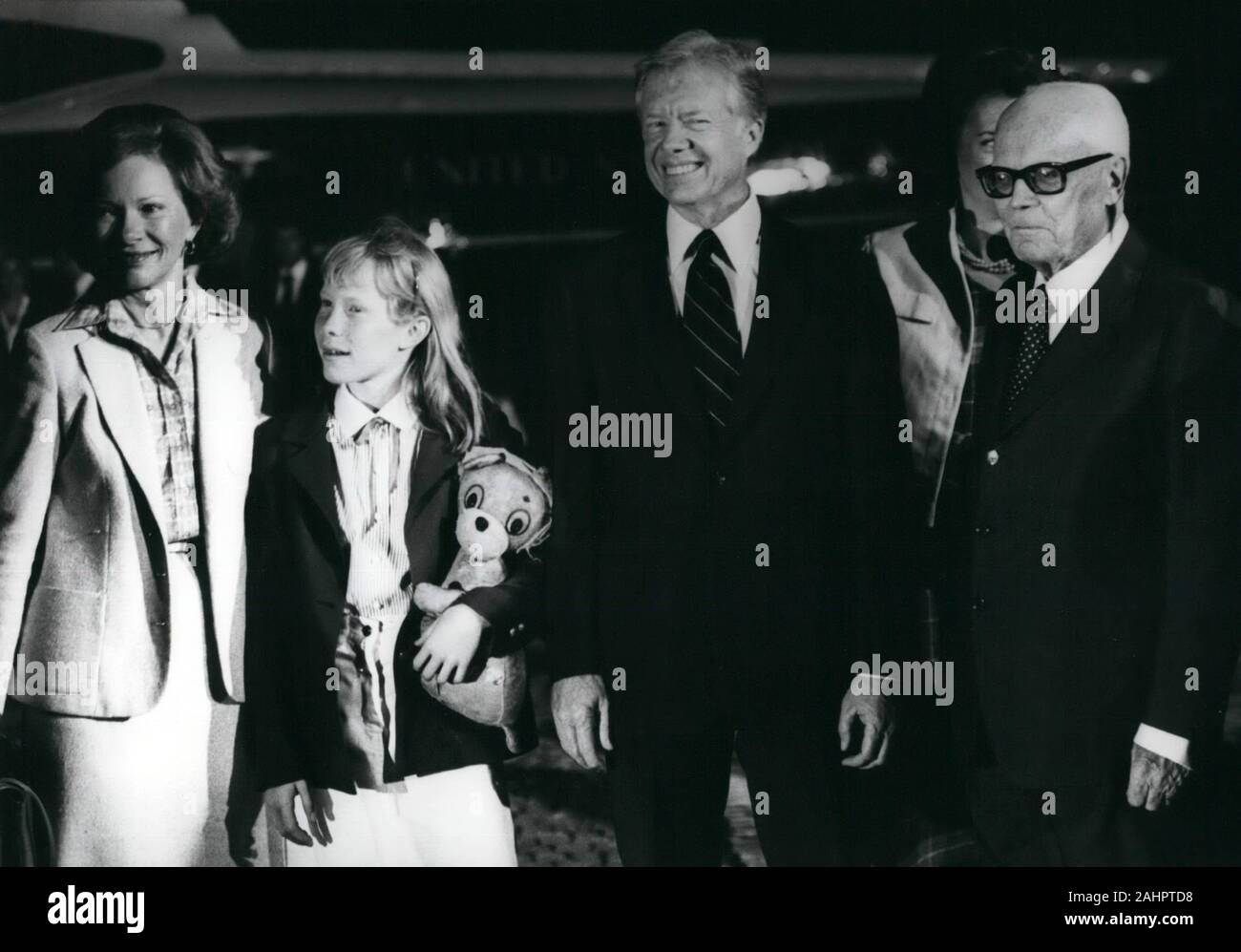 Rome, Italy. 19th June, 1980. The Carter family is met by President SANDRO PERTINI, right, on their night arrival. President JIMMY CARTER, second from right, and his wife First Lady ROSALYN CARTER, left, arrived by helicopter with their daughter AMY CARTER, second from left. The helicopter landed in the park of the Quirinali palace where the President and his family will stay while in Rome. Amy carried her ''Snoopy'' stuffed animal on the flight from Washington, DC Credit: Keystone Pictures USA/ZUMAPRESS.com/Alamy Live News Stock Photo