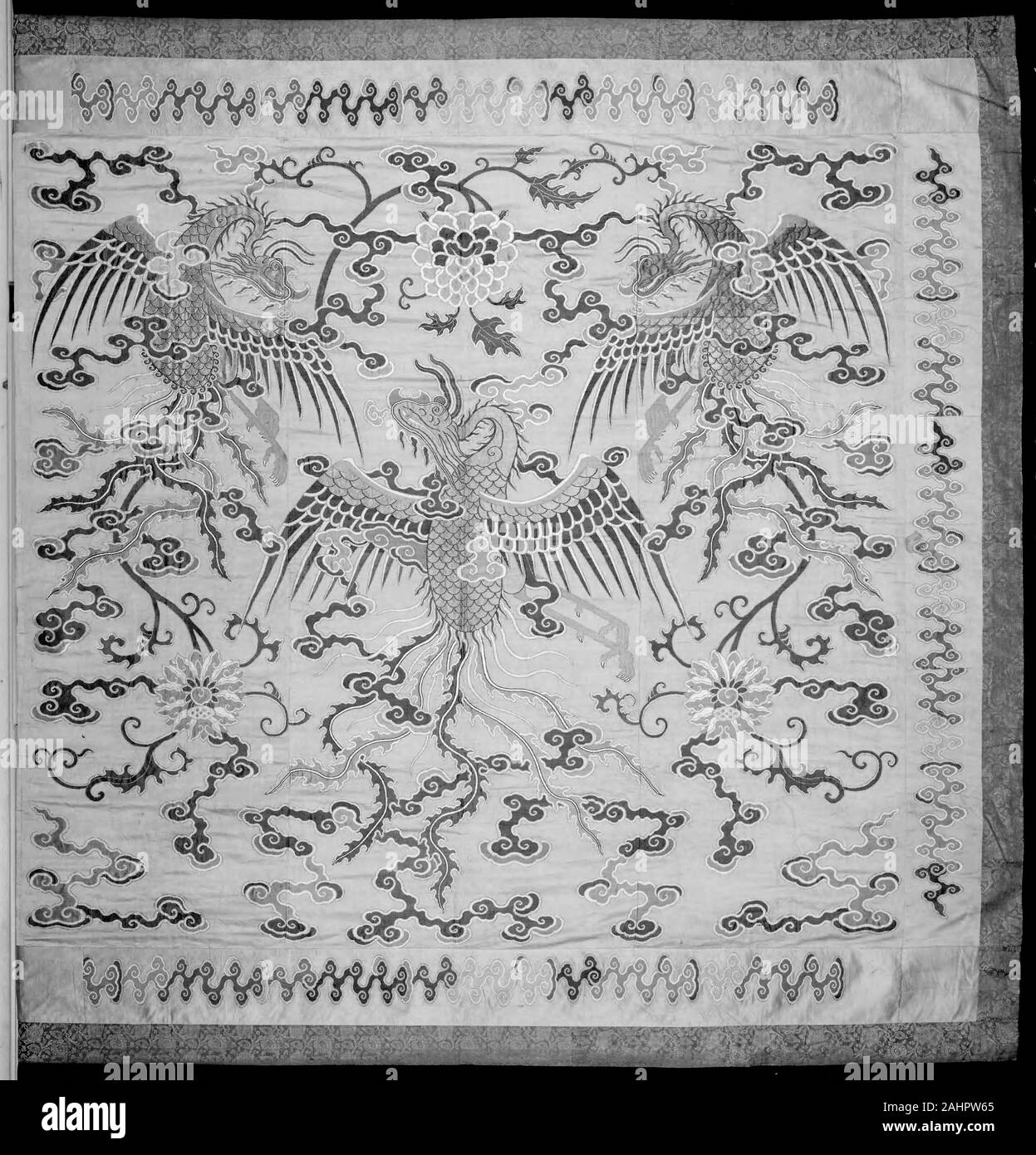 Manchu. Bed Curtain. 1650–1750. China. center panel and inner borders silk, gold-leaf-over-lacquered-paper strips, and gold-leaf-over-lacquered-paper-strip-wrapped silk, warp-float faced 7 1 satin weave with supplementary brocading wefts bound in weft-float faced 1 3 'S' twill interlacings; outer border silk, warp-float faced 5 1 twill weave with weft-float faced 1 2 'Z' twill interlacings of secondary binding warps and supplementary patterning wefts; lined with cotton, plain weave Stock Photo