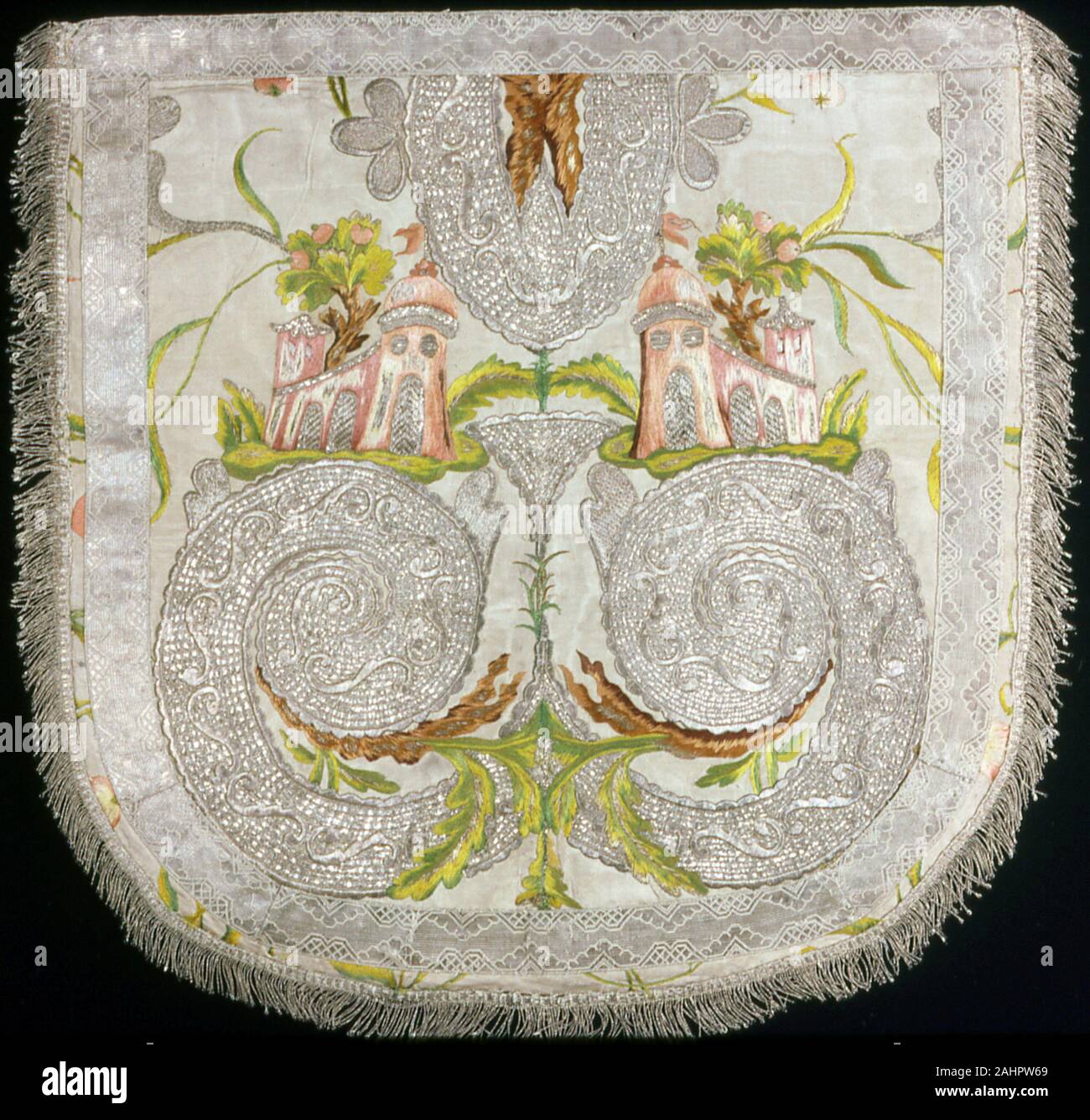 Hood. 1775–1825. France. Silk, warp-faced, weft-ribbed plain weave; embroidered with silk floss and yarns, gilt- and silvered-metal-strip-wrapped silk, and silvered-metal strips in satin, split, and stem stitches; couching, padded couching, laid work and French knots; edged with silk and gilt-metal-strip-wrapped silk, woven tapes and fringe Stock Photo