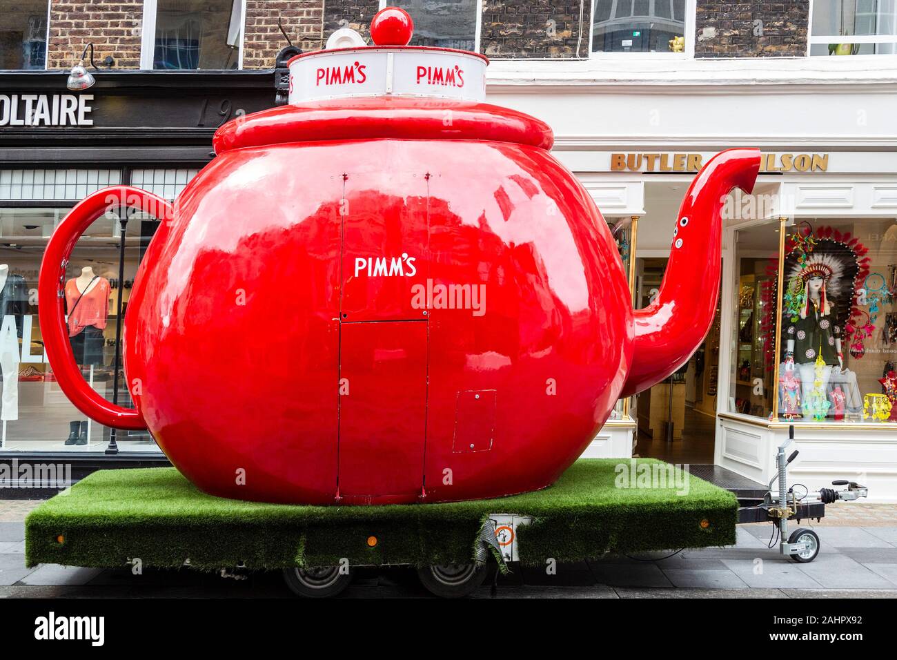 Giant red Pimm's teapot in Soho, London, England, United Kingdom