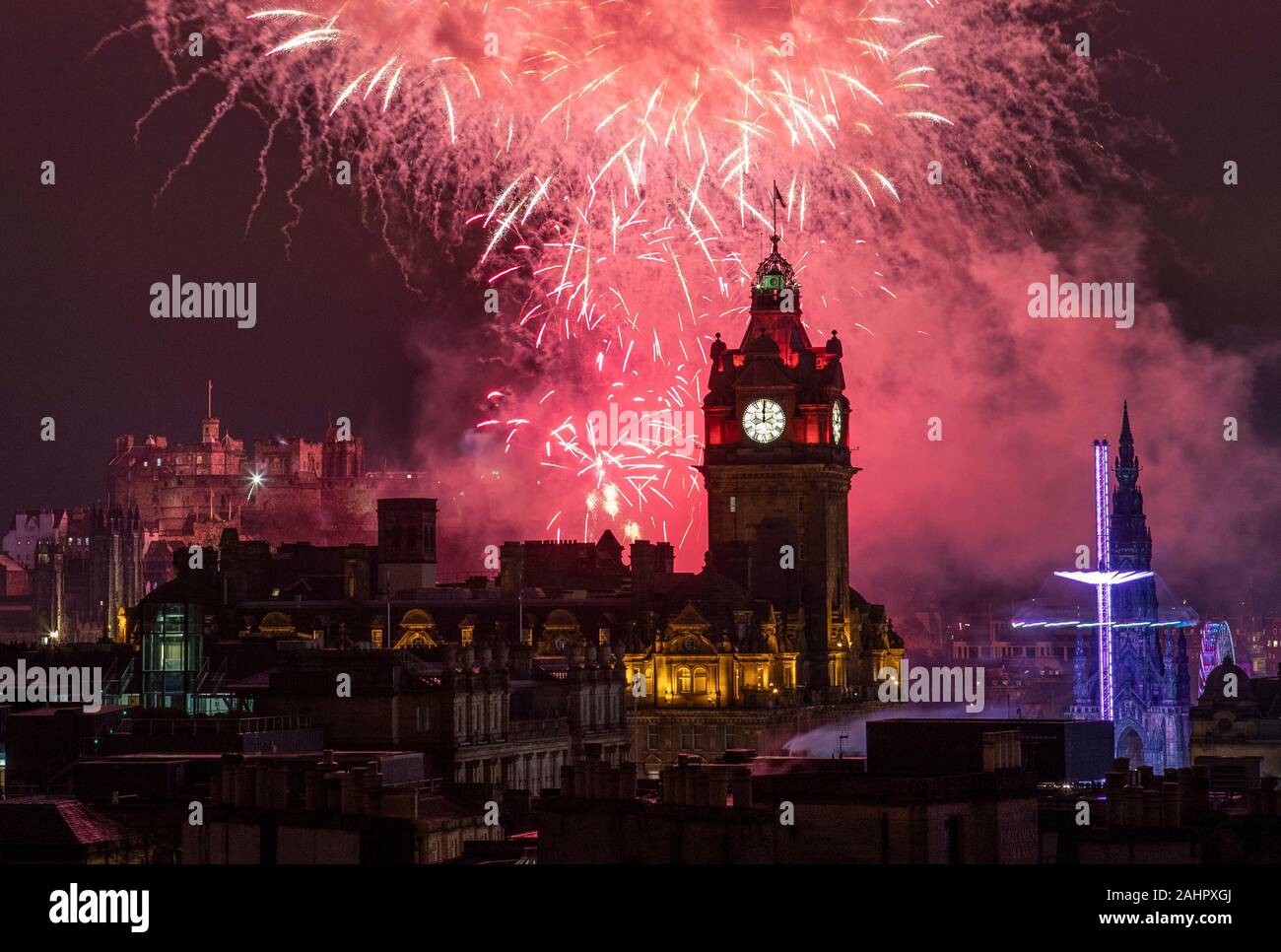 Fireworks Are Launched From Edinburgh Castle At Midnight During The Fireworks Are Launched From Edinburgh Castle At Midnight During The