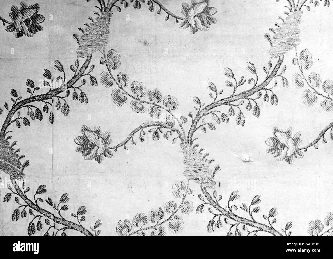Panel. 1732–1752. Spitalfields. Silk, gold-gilt strip, and gold-gilt-strip-wound-around-a-silk-fiber core, warp-float faced 7 1 satin weave with supplementary brocading wefts bound in 3 1 twill interlacing Stock Photo