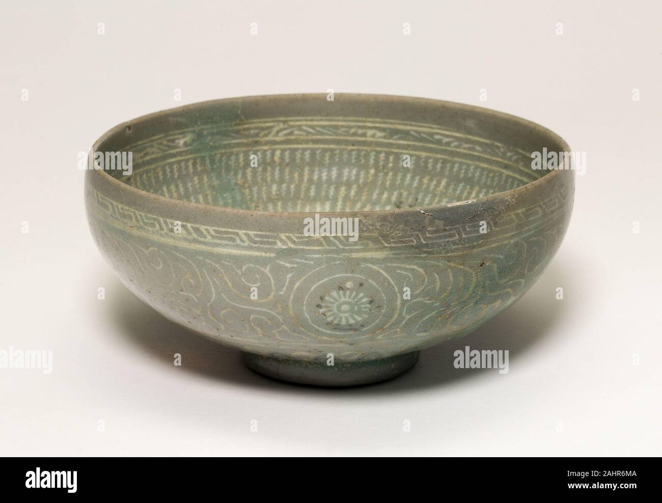 Stoneware with underglaze inlaid decoration of black and white clays hi