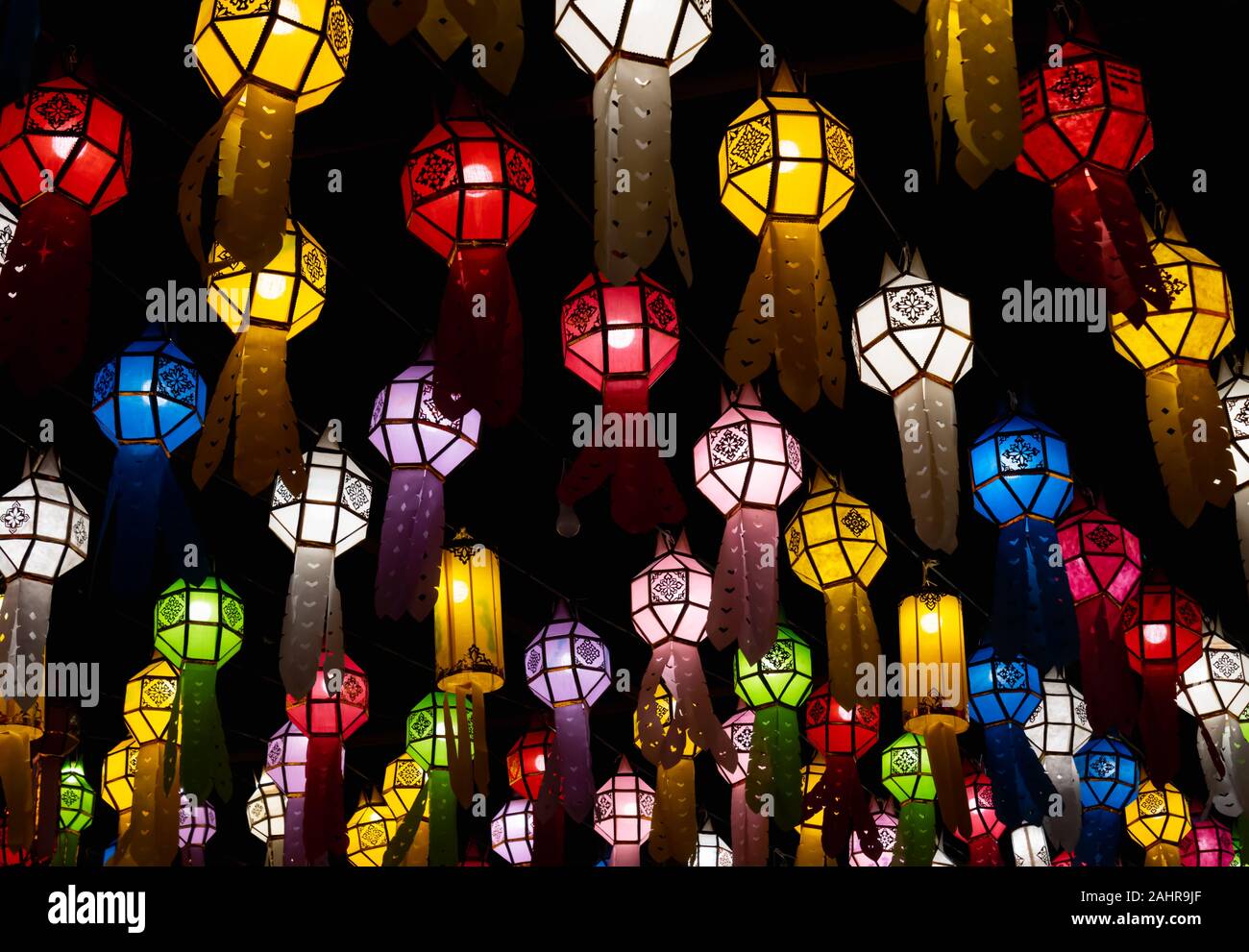 Colorful Paper Lanterns or Paper Lamp in Loi Krathong Festival on Night Scene in Zoom View. Paper lanterns in Yi Peng festival Stock Photo