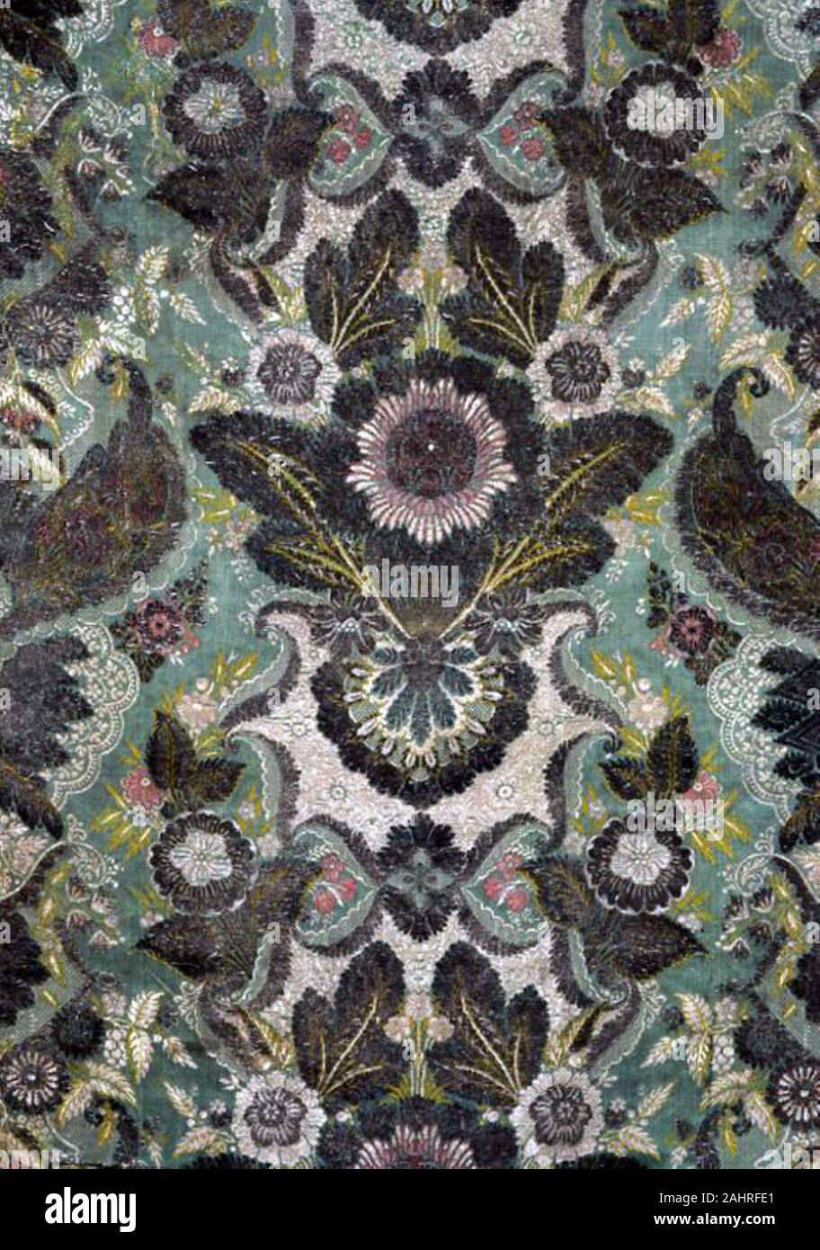 Panel (Showing Lace Design). 1716–1736. France. Silk, silvered-metal-strip-wrapped silk, warp-float faced 7 1 satin weave with supplementary brocading wefts and supplementary binding warps tying some self-patterning ground wefts in plain interlacing Stock Photo