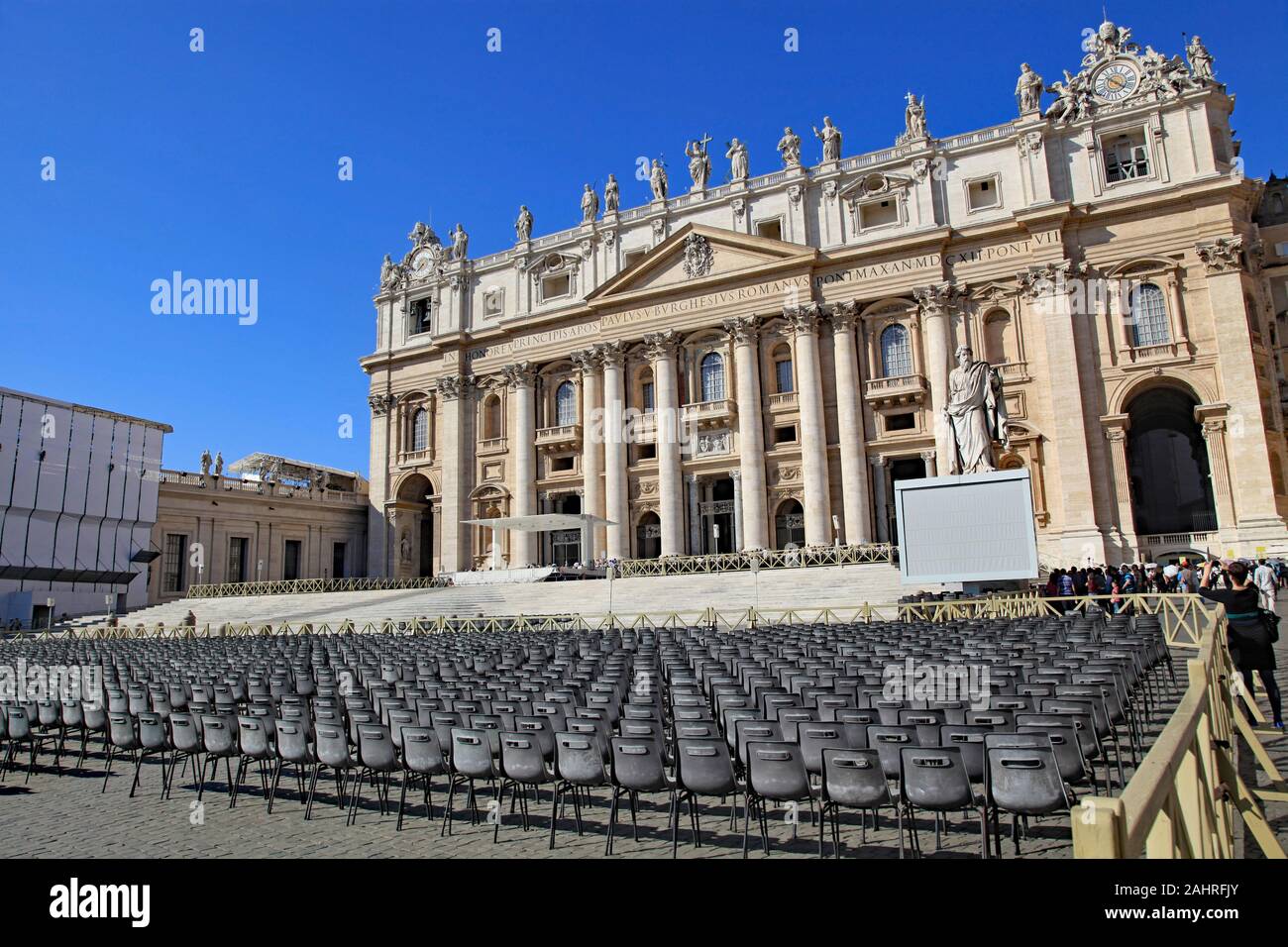 Empty chairs set up for a papal audience in front of St. Peter's Basilica, Vatican City, Rome Stock Photo