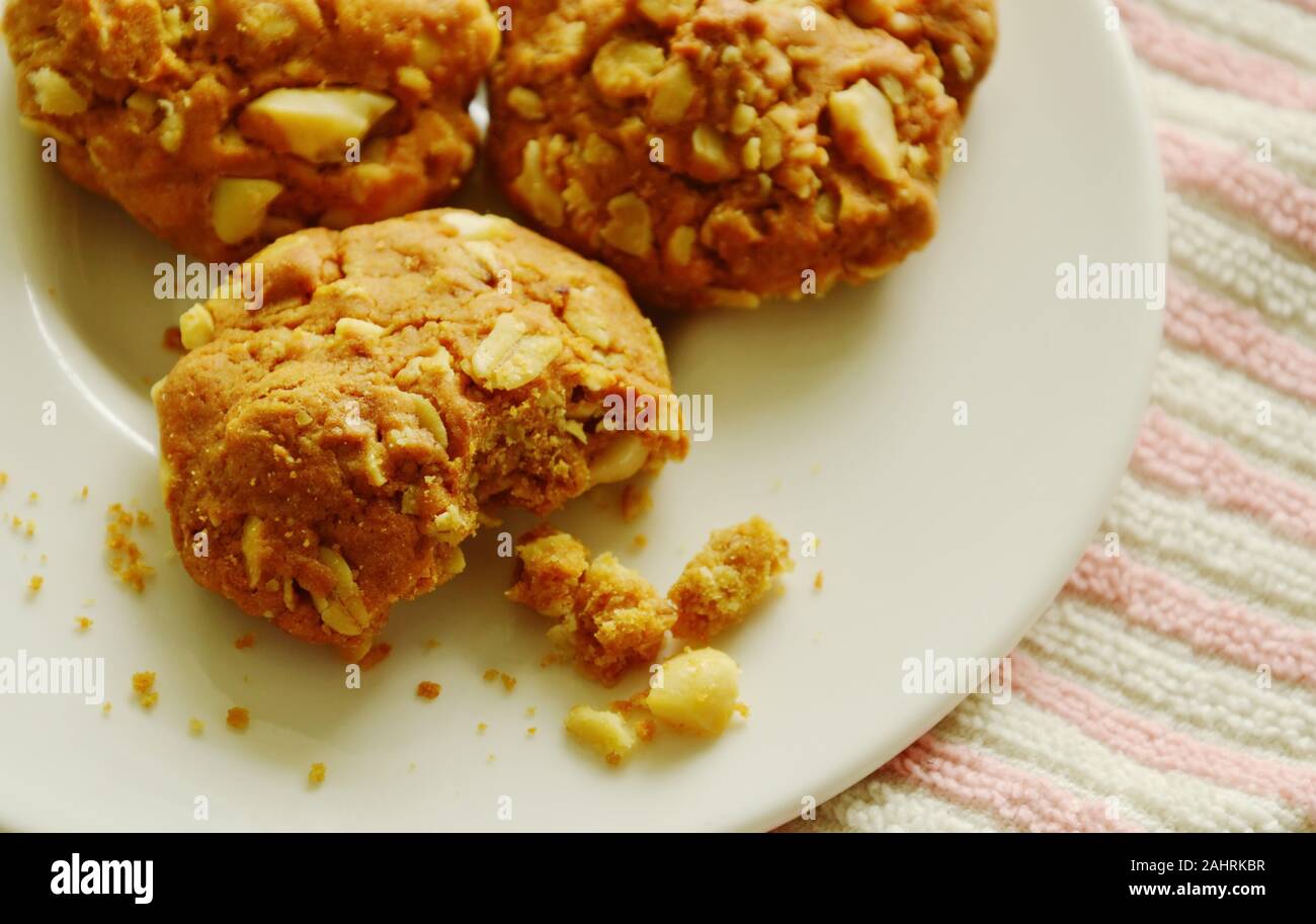cereal butter cookie bite on white dish Stock Photo