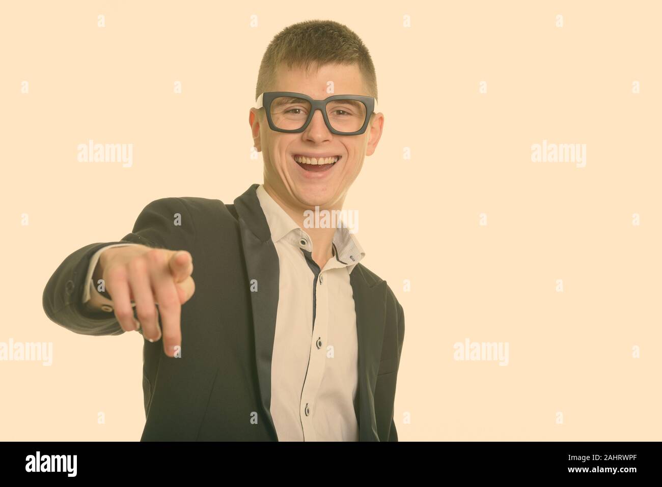 Studio shot of young businessman in suit isolated against white background Stock Photo