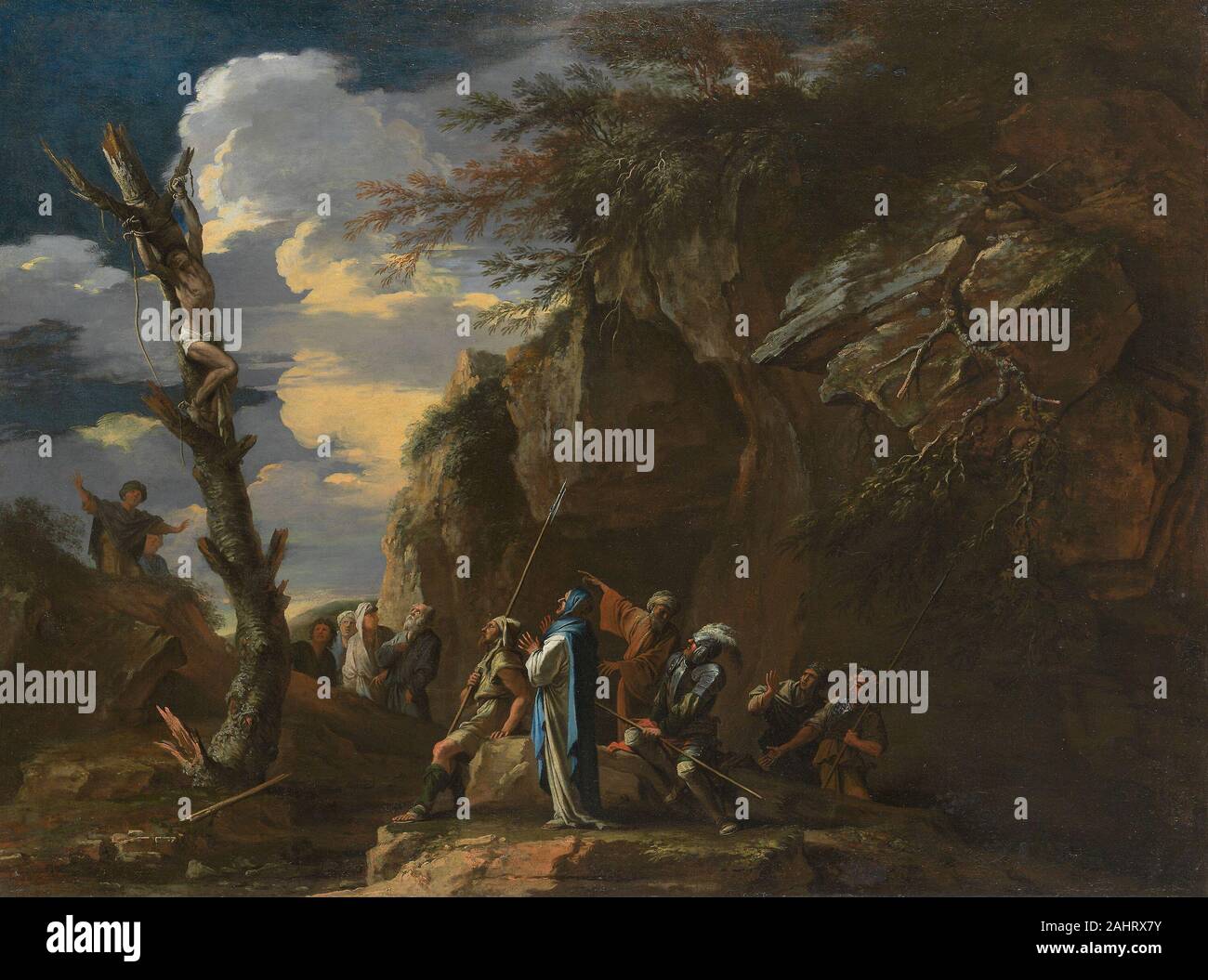Salvator Rosa. Polycrates' Crucifixion. 1663–1665. Italy. Oil on canvas Salvator Rosa developed a kind of dramatic landscape in which nature is presented as wild, dangerous, and filled with striking effects of light, broken trees, jagged cliffs, and dark grottoes. A native of Naples, Rosa settled in Rome in 1649, producing dramatic works that are regarded as counter-parts to the calm, classical landscapes of Claude Lorrain and Nicolas Poussin. Rosa’s dark style is well suited to the subject of this pair of paintings; they recount an episode from the Greco-Persian Wars as told by the ancient Gr Stock Photo