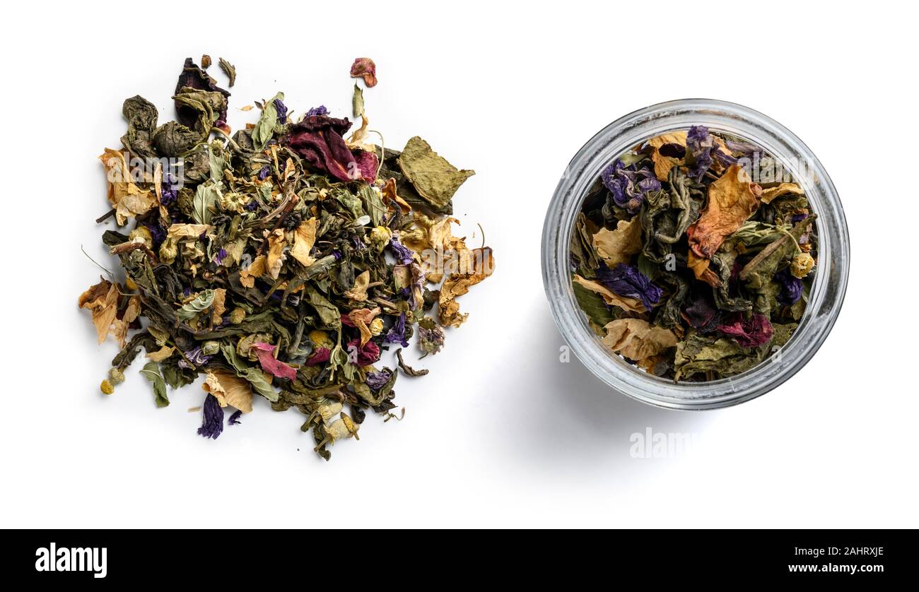 Green tea with natural aromatic additives. Top view on white background ...
