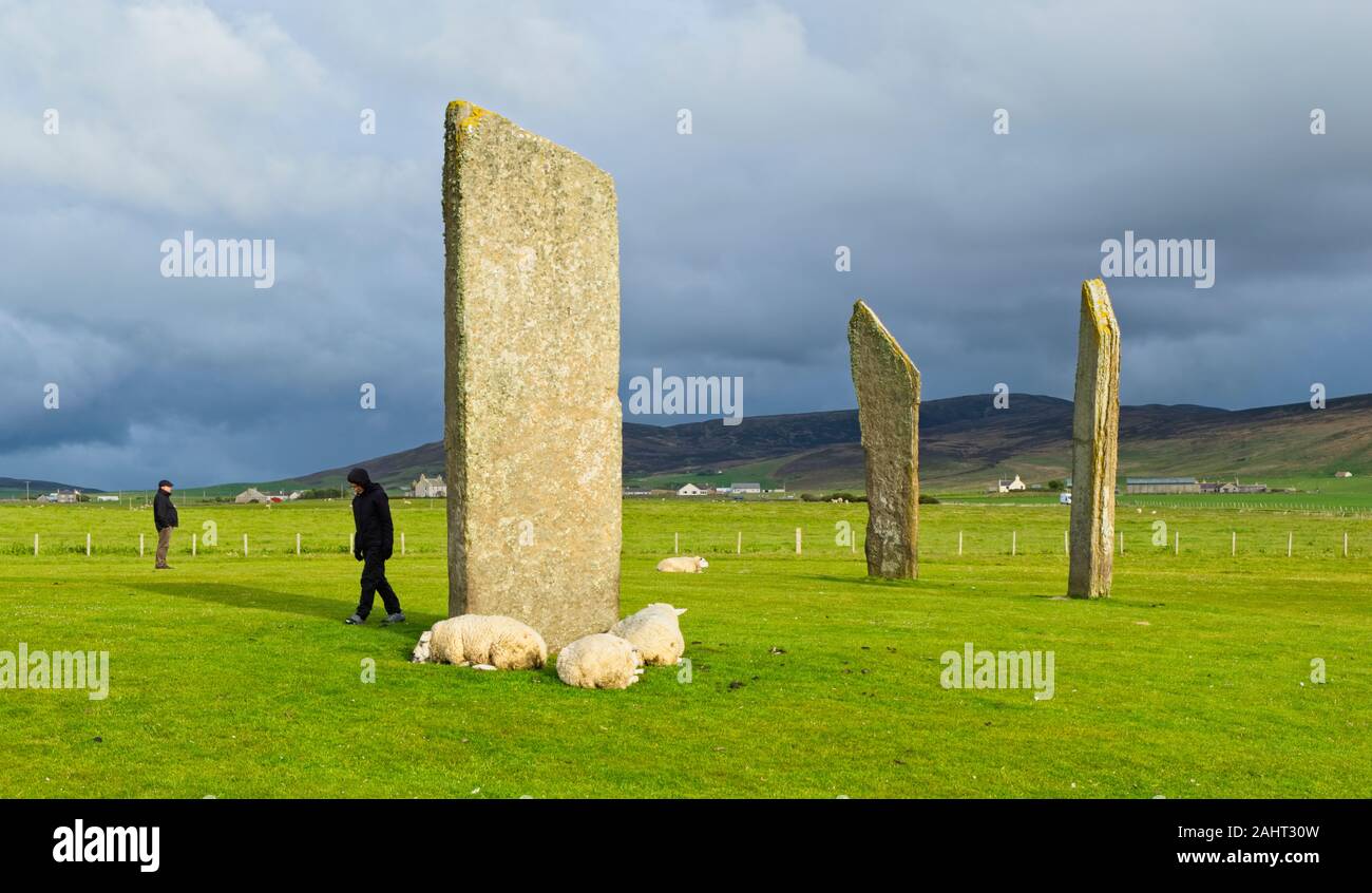 The Standing Stones of Stenness in the evening light, under a grey sky Stock Photo