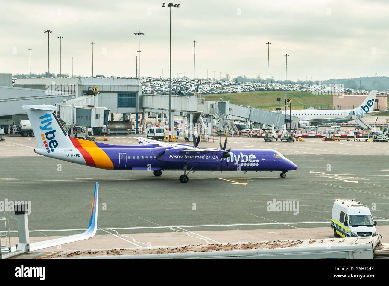Flybe De Havilland Canada Dash 8-400 Aircraft taxis at Birmingham Airport, West Midlands, UK. Stock Photo