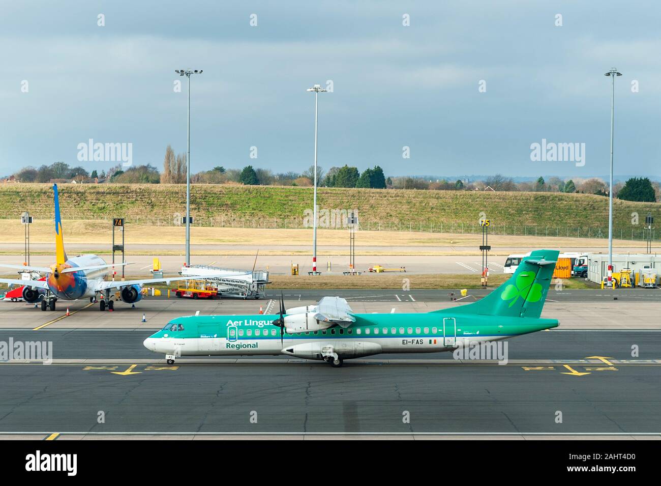 Aer Lingus Atr 72-600 aircraft EI-FAS taxis before take off from Birmingham Airport (BHX), UK to Cork (ORK), Ireland. Stock Photo