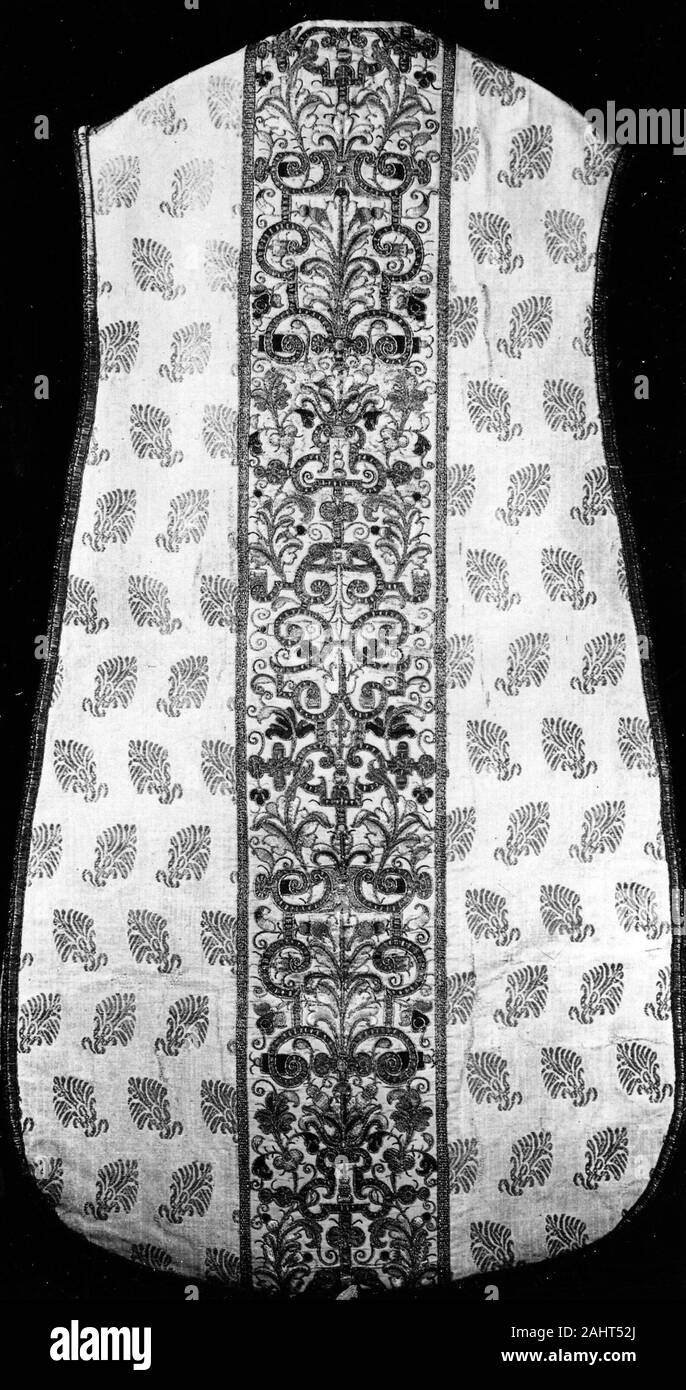 Chasuble with Orphrey Bands. 1601–1700. Spain. Silk and gilt-metal-strip-wrapped silk, plain weave with gilt-metal strip facing wefts and brocading wefts; orphrey bands silk, plain weave with gilt-metal strip facing wefts; embroidered with silk and gilt-metal-strip-wrapped silk and cotton in satin, split, raised stem, and stem stitches; couching; edged with woven fringe Stock Photo