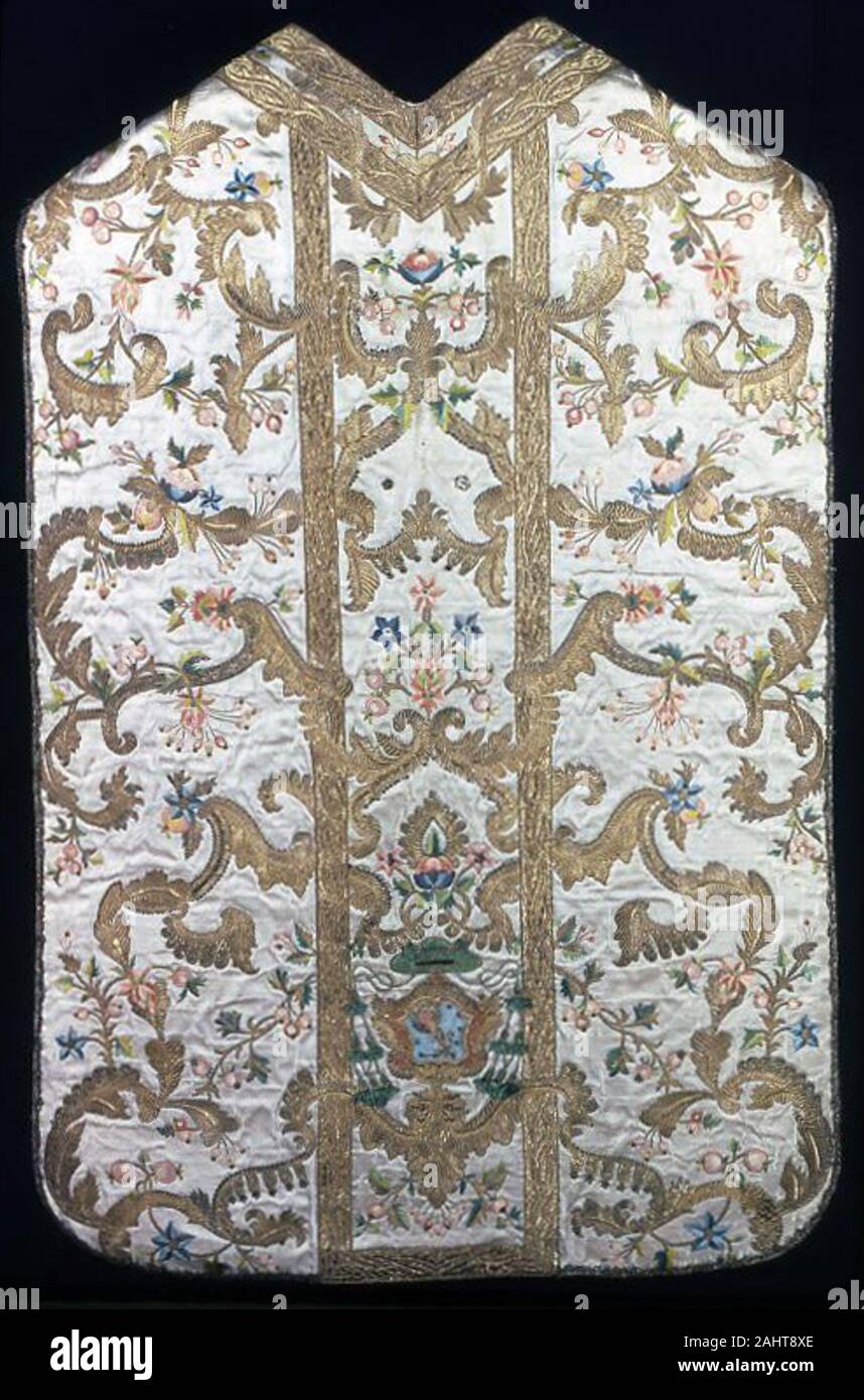 Chasuble. 1700–1750. Italy. Silk, warp-float faced satin weave; appliquéd with silk, plain weave; embroidered with silk, gilt-metal-strip-wrapped silk, gilt-metal strips and purl in padded satin, satin, and split stitches; couching and padded couching; paillettes; edged with gilt-metal-strip-wrapped silk and gilt-metal strips, bobbin straight lace Stock Photo