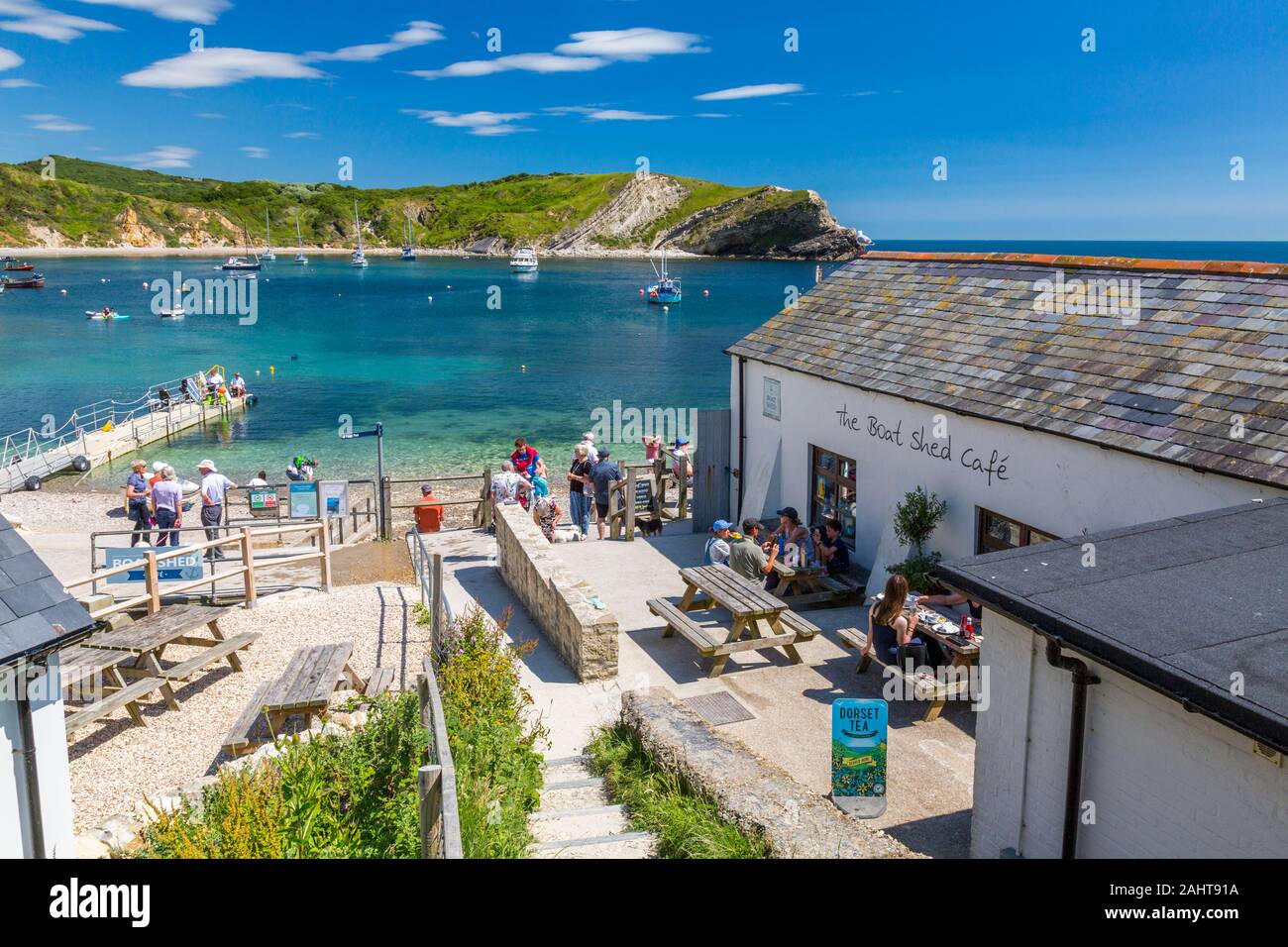 The Boat Shed Cafe overlooks Lulworth Cove on Dorset's Jurassic Heritage Coast, England, UK Stock Photo