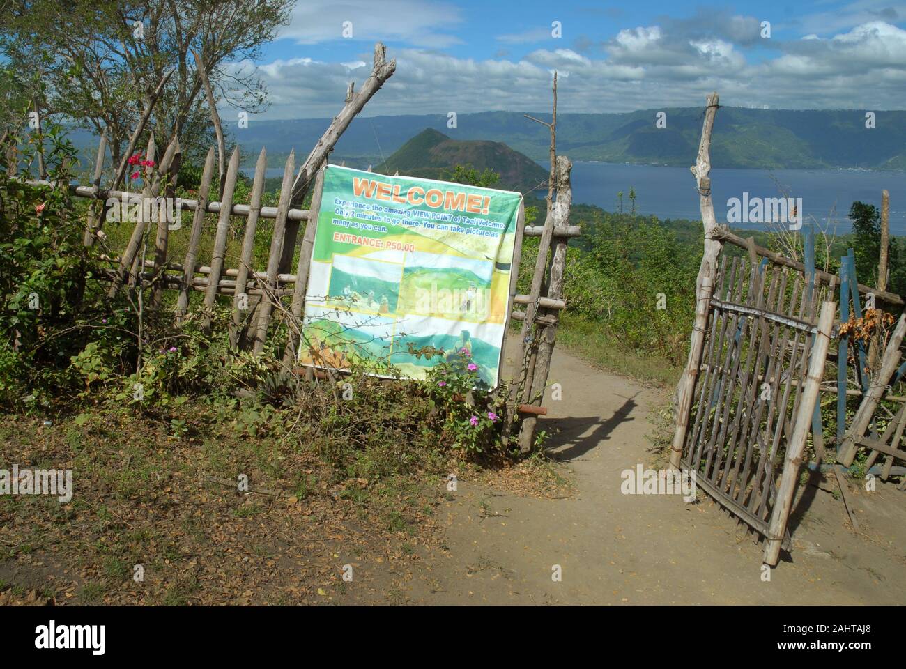 Ripped Welcome to Taal Volcano Sign, Taal Volcano, Talisay, Batangas Province, Philippines. Stock Photo
