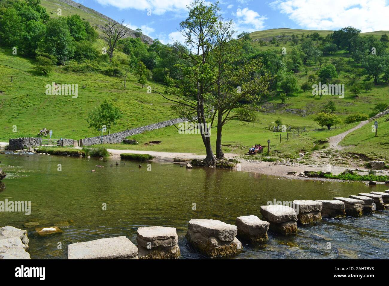 Stepping stones over the River Dove at Dovedale, Peak District, Derbyshire, England, UK Stock Photo