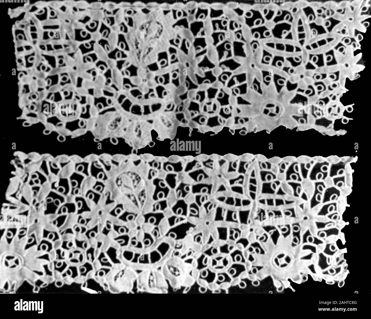 Border and Two Fragments. 1850–1900. Carrickmacross. Cotton, plain weave; cut work embroidered in couching and with buttonhole bars; appliquéd with machine-made net; embroidered with cotton in bead insertion stitches Stock Photo