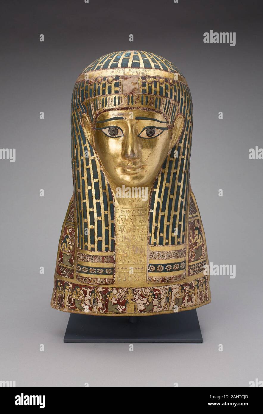 Ancient Egyptian. Mummy Mask. 100 BC–1 BC. Egypt. Cartonnage, gold leaf, pigment Stock Photo