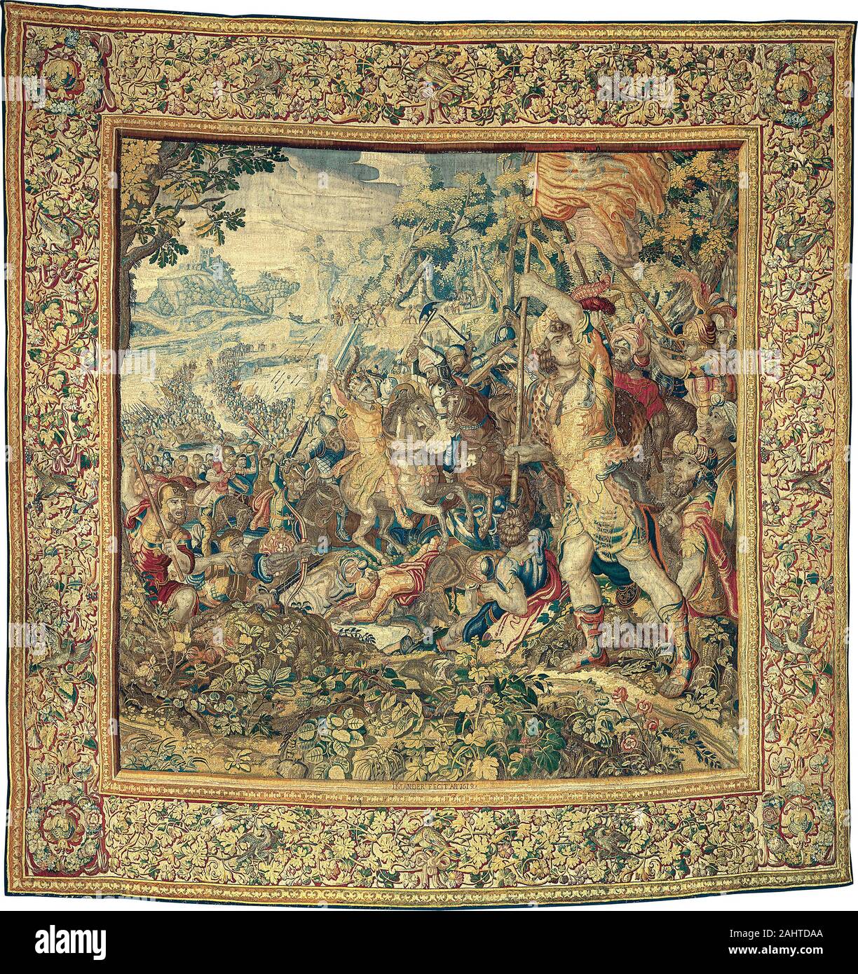 Karel van Mander, II (Designer). The Crossing of the Granicus, from The Story of Alexander the Great. 1619. Holland. Wool and silk, slit and double interlocking tapestry weave This tapestry dramatizes a battle fought in 334 B.C. between the Macedonians and the Persians. Alexander the great, king of the Macedonians, is depicted just left of center; dressed in ornate gilt armor, he rides a white horse and raises a sword boldly above his head. Facing him is a Persian general on a dark horse with both hands grasped around an axe. Although Alexander appears imperiled, he was ultimately victorious i Stock Photo
