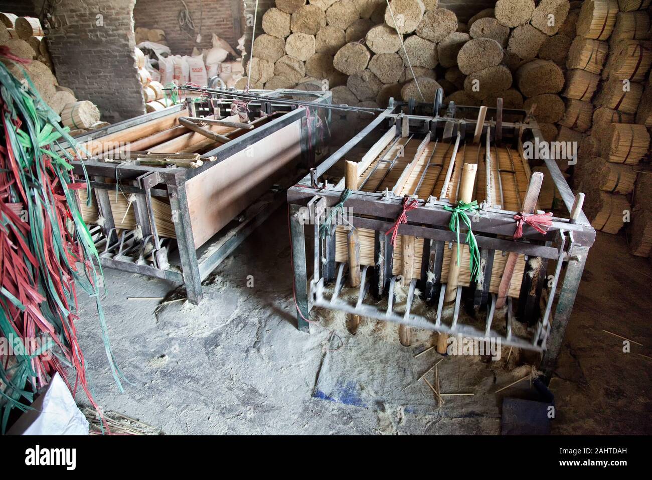 Machine for drying bamboo chopsticks in factory. Vietnam, Hoa Binh Province, Mai Chau Stock Photo