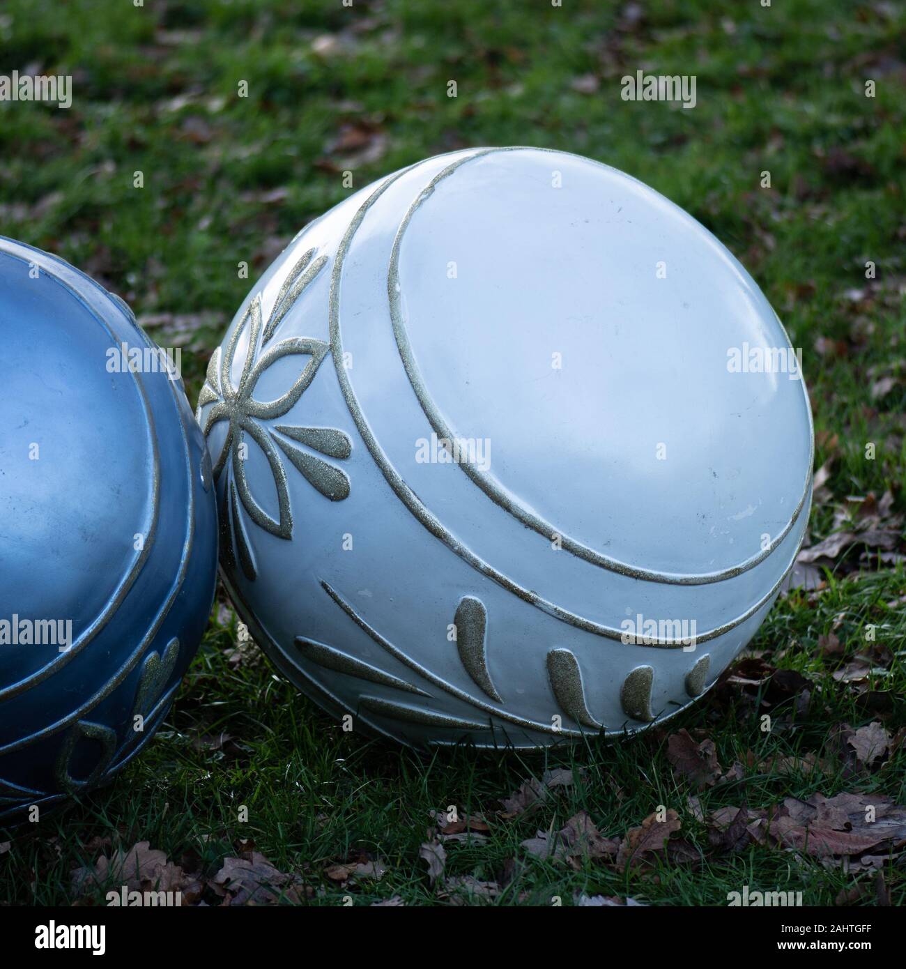 Giant Christmas baubles on the ground Stock Photo