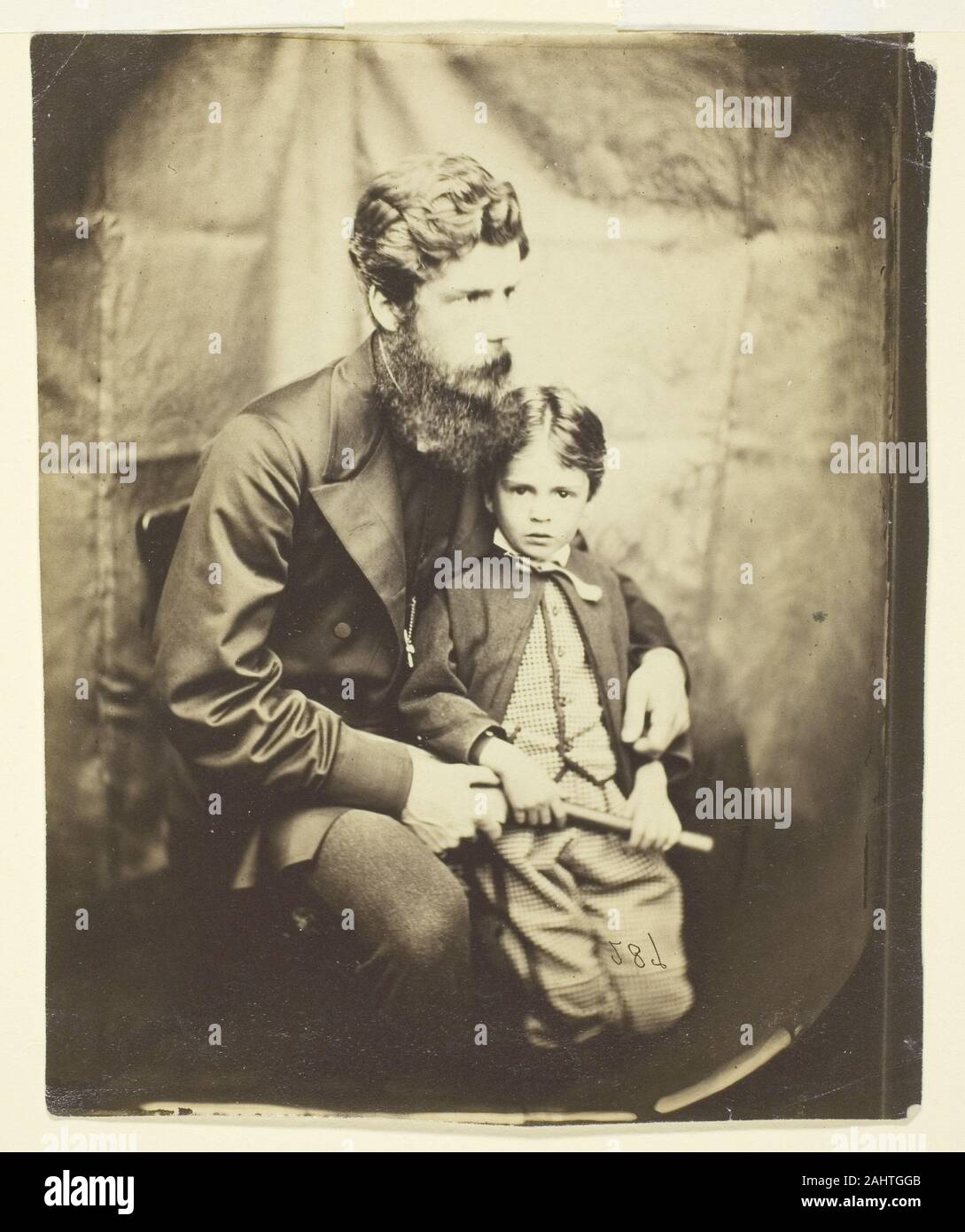 Lewis Carroll. Rev. James Langton Clark and son Charles (Robin). 1864. England. Albumen silver print Stock Photo