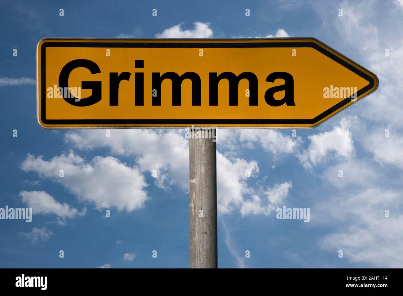 Detail photo of a signpost with the inscription Grimma, Saxony, Germany, Europe Stock Photo