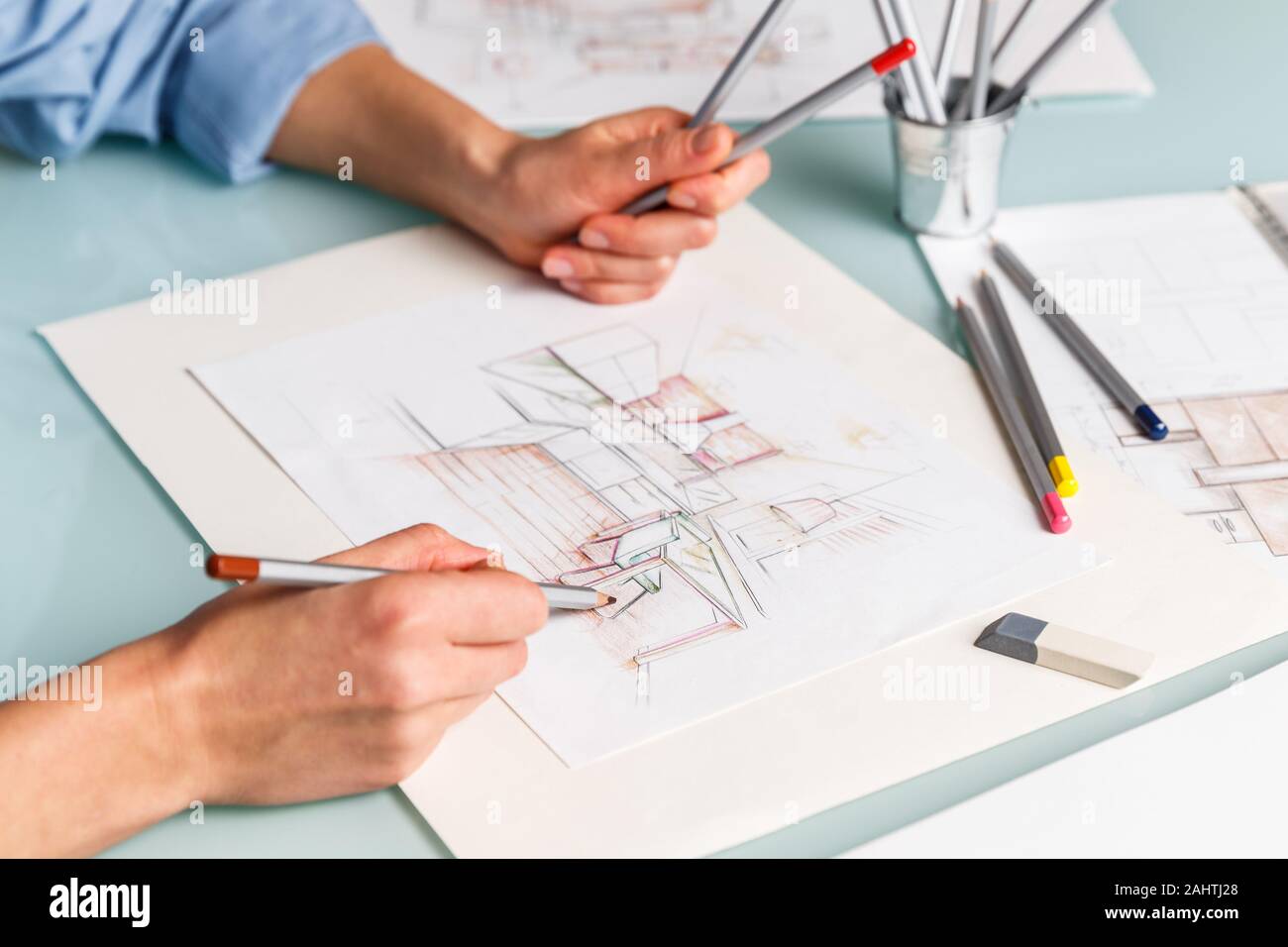 Interior designer drawing pencil sketch of a kitchen. Interior design ...