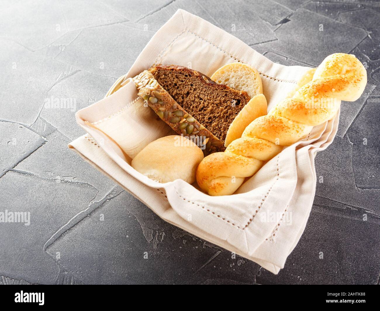 Bread basket in restaurant, freshly baked food. French pastry concept