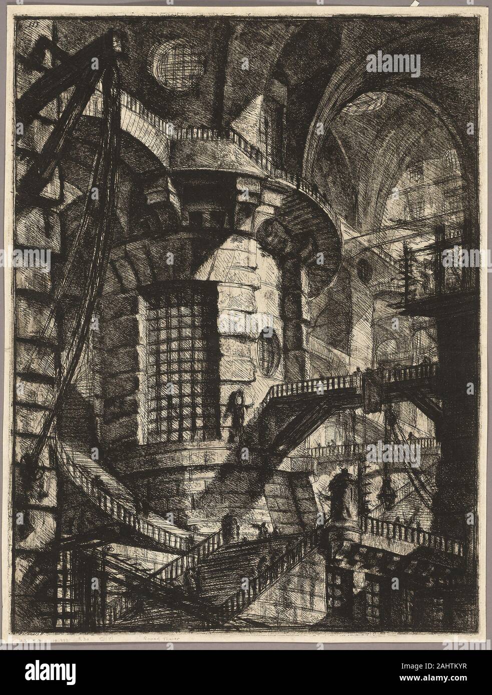 Giovanni Battista Piranesi. The Round Tower, plate 3 from the second edition of Carceri d'invenzione (Imaginary Prisons). 1761–1765. Italy. Etching, engraving, sulphur tint, and burnishing in black on ivory laid paper In addition to dramatic views of Roman architecture, Giovanni Battista Piranesi created a series of prison interiors that were entirely invented. These vast, entangled passageways and cavernous chambers were first printed around 1750. Ten years later, Piranesi reworked the plates, heightening their ominousstate in an implied critique of social injustice. Stock Photo
