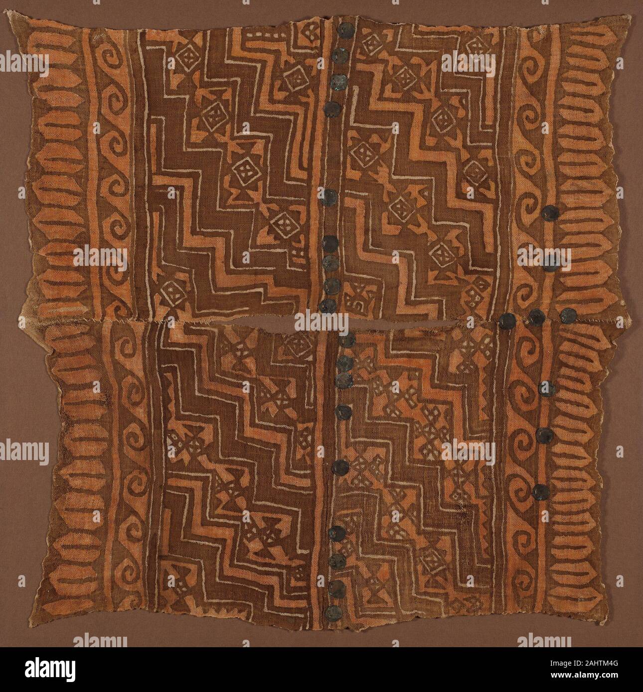 Chimú. Tunic. 1470–1532. Peru. Cotton, plain weave; painted; applied metal ornaments Stock Photo