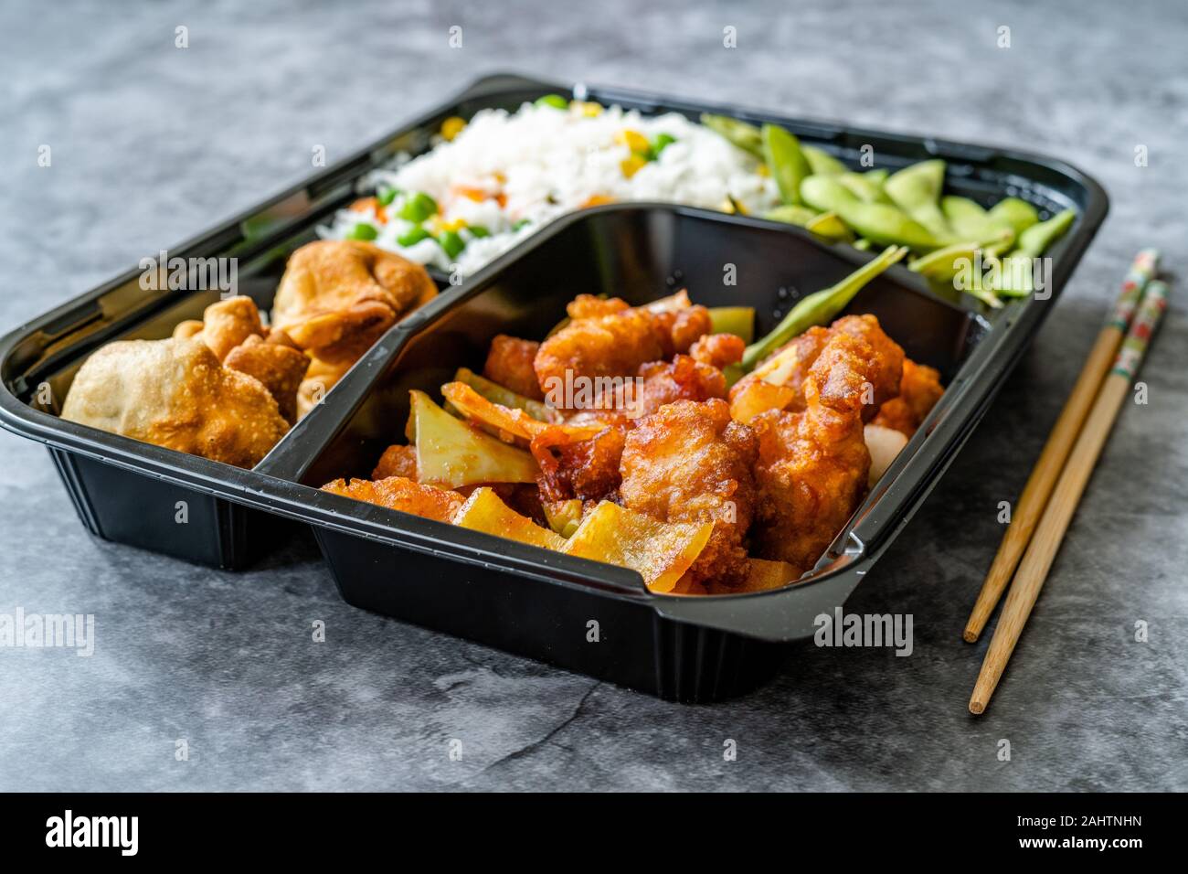 Take Away Japanese Food Bento Box Menu Set With Chicken Fried Dumplings Edamame And Rice With Vegetables In Plastic Box Package Container Traditi Stock Photo Alamy