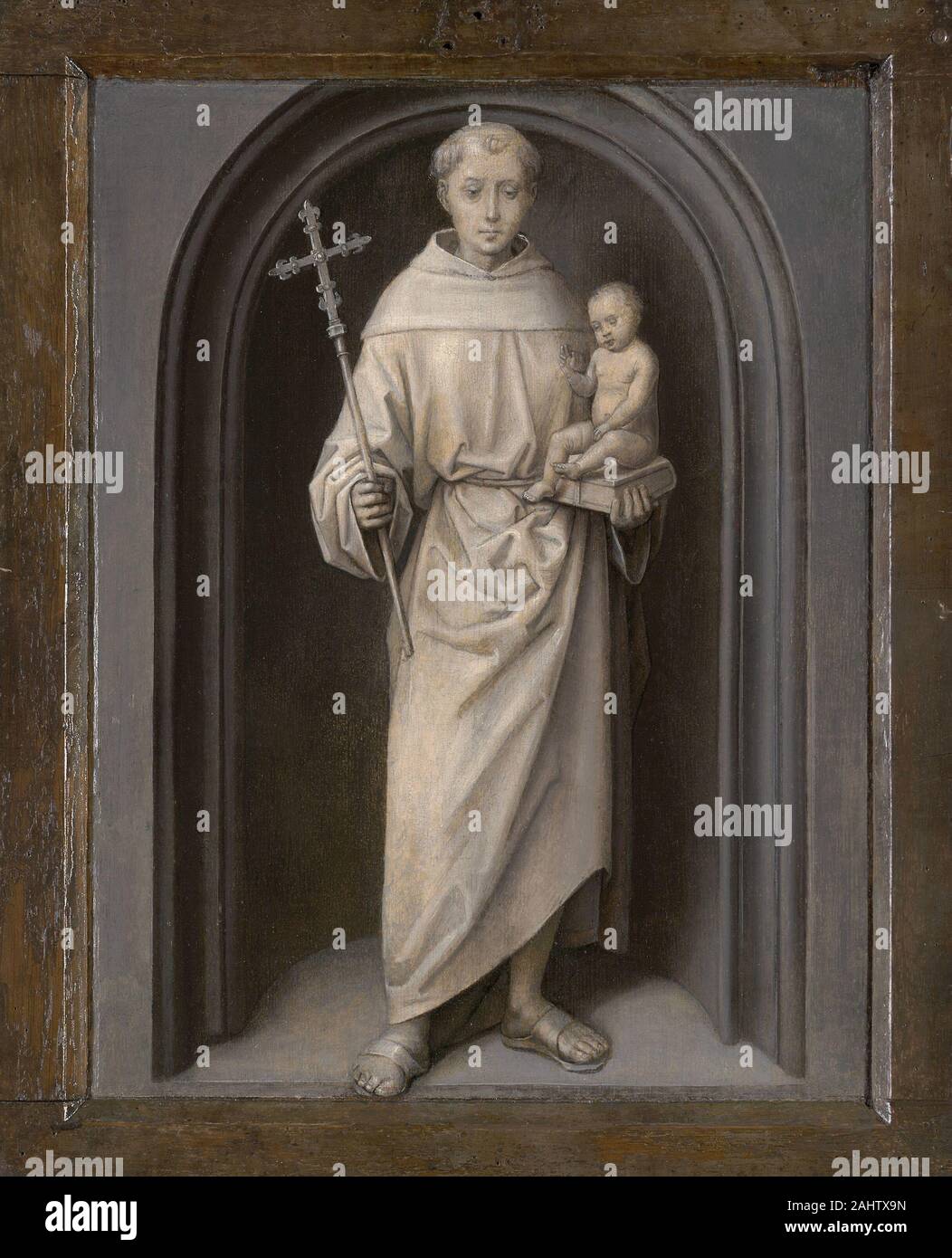 Hans Memling. Saint Anthony of Padua. 1480–1490. Netherlands. Oil on panel Hans Memling probably worked with Rogier van der Weyden in Brussels before settling in Bruges in 1465. Van der Weyden was well known for his exquisite devotional diptychs, and Memling was influenced by his work, though he made his paired paintings more realistic by setting the figures in a measurable domestic space. This portrait of the unidentified patron and the image of the Virgin and Child were separated many years ago; they were reunited at the Art Institute of Chicago in 1953. Unfortunately, Portrait of a Man in P Stock Photo