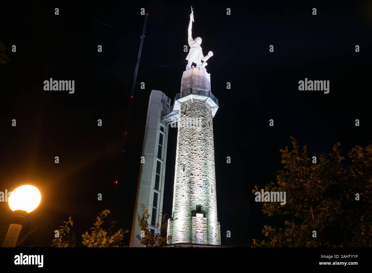 Birmingham, AL - October 7, 2019: Historic 56 Foot Tall Vulcan Statue and observation tower at Night Stock Photo