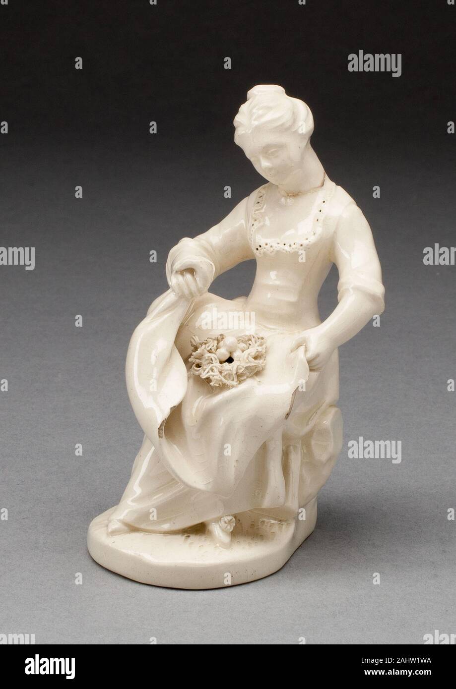 Girl with Bird Nest. 1770–1780. Italy. Lead-glazed earthenware Stock Photo